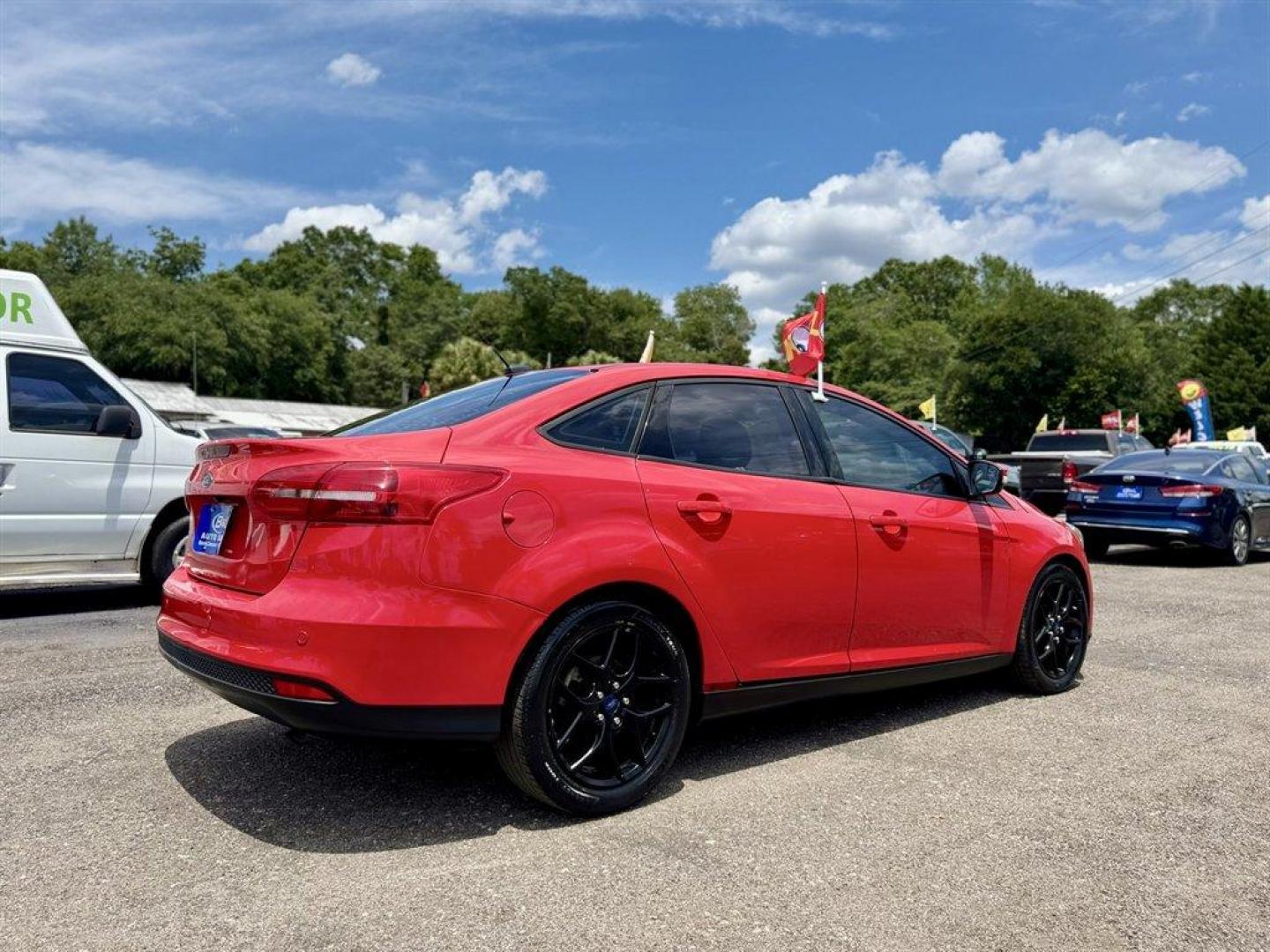 2016 Red /Black Ford Focus (1FADP3F24GL) with an 2.0l I-4 DI Dohc Flex 2.0 engine, Automatic transmission, located at 745 East Steele Rd., West Columbia, SC, 29170, (803) 755-9148, 33.927212, -81.148483 - Special Internet Price! 2016 Ford Focus with AM/FM radio, Backup camera, Navigation, Cruise control, Sunroof, Leather interior, Powered driver seat, Powered windows, Powered door locks, Plus more! - Photo#3