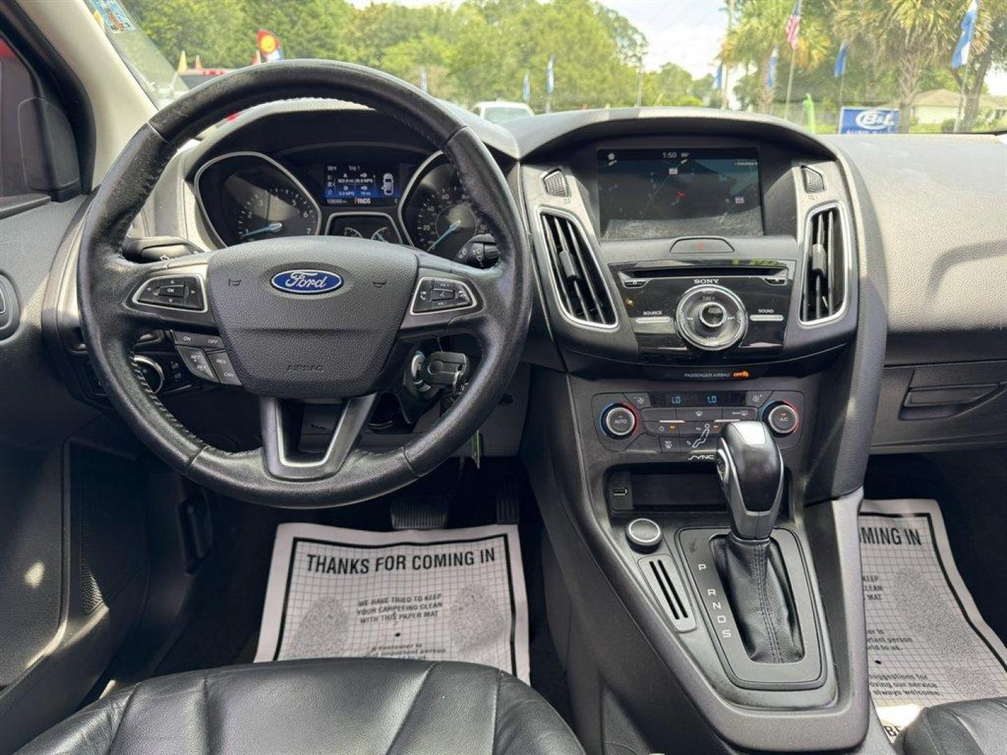 2016 Red /Black Ford Focus (1FADP3F24GL) with an 2.0l I-4 DI Dohc Flex 2.0 engine, Automatic transmission, located at 745 East Steele Rd., West Columbia, SC, 29170, (803) 755-9148, 33.927212, -81.148483 - Special Internet Price! 2016 Ford Focus with AM/FM radio, Backup camera, Navigation, Cruise control, Sunroof, Leather interior, Powered driver seat, Powered windows, Powered door locks, Plus more! - Photo#6
