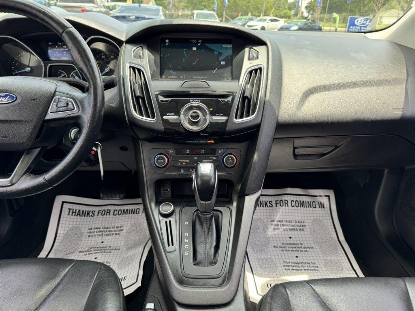 2016 Red /Black Ford Focus (1FADP3F24GL) with an 2.0l I-4 DI Dohc Flex 2.0 engine, Automatic transmission, located at 745 East Steele Rd., West Columbia, SC, 29170, (803) 755-9148, 33.927212, -81.148483 - Special Internet Price! 2016 Ford Focus with AM/FM radio, Backup camera, Navigation, Cruise control, Sunroof, Leather interior, Powered driver seat, Powered windows, Powered door locks, Plus more! - Photo#11