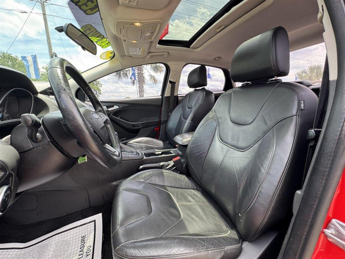 2016 Red /Black Ford Focus (1FADP3F24GL) with an 2.0l I-4 DI Dohc Flex 2.0 engine, Automatic transmission, located at 745 East Steele Rd., West Columbia, SC, 29170, (803) 755-9148, 33.927212, -81.148483 - Special Internet Price! 2016 Ford Focus with AM/FM radio, Backup camera, Navigation, Cruise control, Sunroof, Leather interior, Powered driver seat, Powered windows, Powered door locks, Plus more! - Photo#22