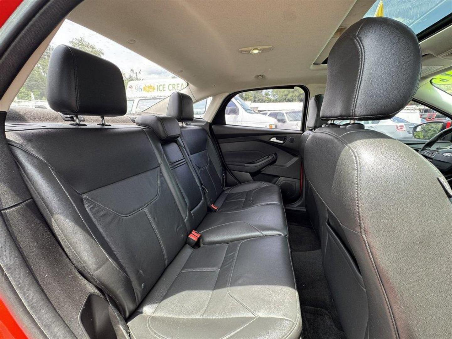 2016 Red /Black Ford Focus (1FADP3F24GL) with an 2.0l I-4 DI Dohc Flex 2.0 engine, Automatic transmission, located at 745 East Steele Rd., West Columbia, SC, 29170, (803) 755-9148, 33.927212, -81.148483 - Special Internet Price! 2016 Ford Focus with AM/FM radio, Backup camera, Navigation, Cruise control, Sunroof, Leather interior, Powered driver seat, Powered windows, Powered door locks, Plus more! - Photo#27