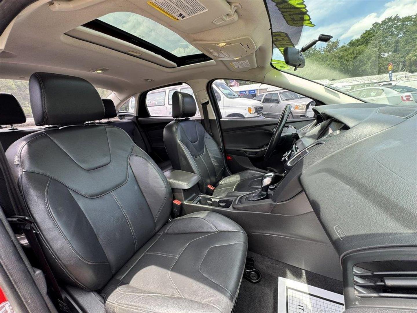 2016 Red /Black Ford Focus (1FADP3F24GL) with an 2.0l I-4 DI Dohc Flex 2.0 engine, Automatic transmission, located at 745 East Steele Rd., West Columbia, SC, 29170, (803) 755-9148, 33.927212, -81.148483 - Special Internet Price! 2016 Ford Focus with AM/FM radio, Backup camera, Navigation, Cruise control, Sunroof, Leather interior, Powered driver seat, Powered windows, Powered door locks, Plus more! - Photo#29