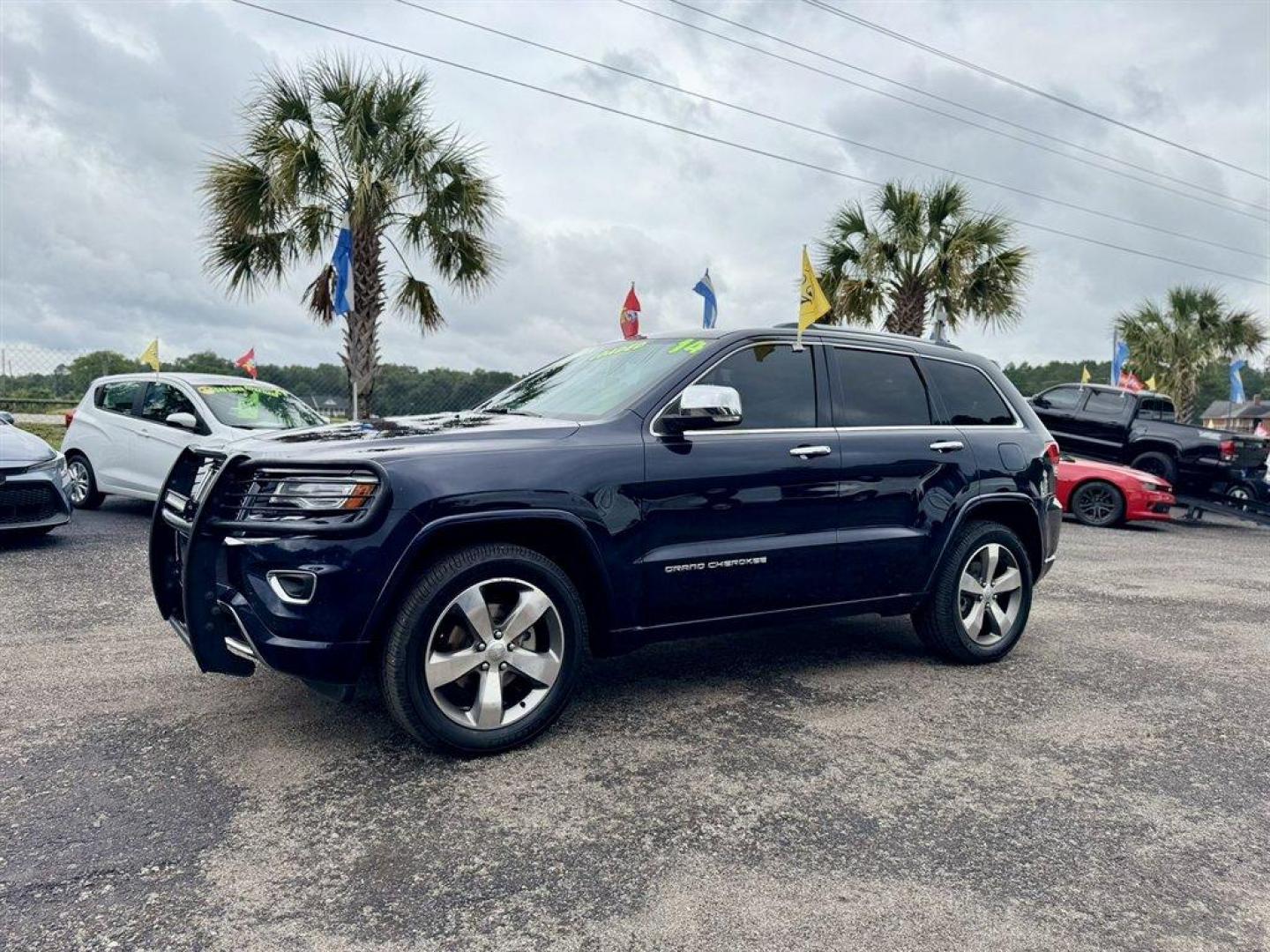 2014 Blue /Black Jeep Grand Cherokee (1C4RJFCG5EC) with an 3.6l V6 MPI Dohc VVT Flex engine, Automatic transmission, located at 745 East Steele Rd., West Columbia, SC, 29170, (803) 755-9148, 33.927212, -81.148483 - Special Internet Price! 2014 Jeep Grand Cherokee with AM/FM radio, Bluetooth, Backup camera, Navigation, Cruise control, Panoramic sunroof, Leather interior, Keyless entry, Push to start, Powered windows, Powered door locks, Plus more! - Photo#0