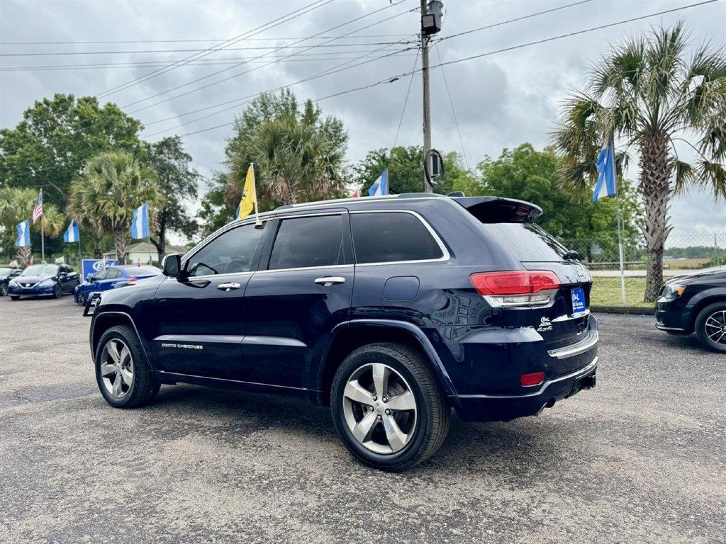 2014 Blue /Black Jeep Grand Cherokee (1C4RJFCG5EC) with an 3.6l V6 MPI Dohc VVT Flex engine, Automatic transmission, located at 745 East Steele Rd., West Columbia, SC, 29170, (803) 755-9148, 33.927212, -81.148483 - Special Internet Price! 2014 Jeep Grand Cherokee with AM/FM radio, Bluetooth, Backup camera, Navigation, Cruise control, Panoramic sunroof, Leather interior, Keyless entry, Push to start, Powered windows, Powered door locks, Plus more! - Photo#3