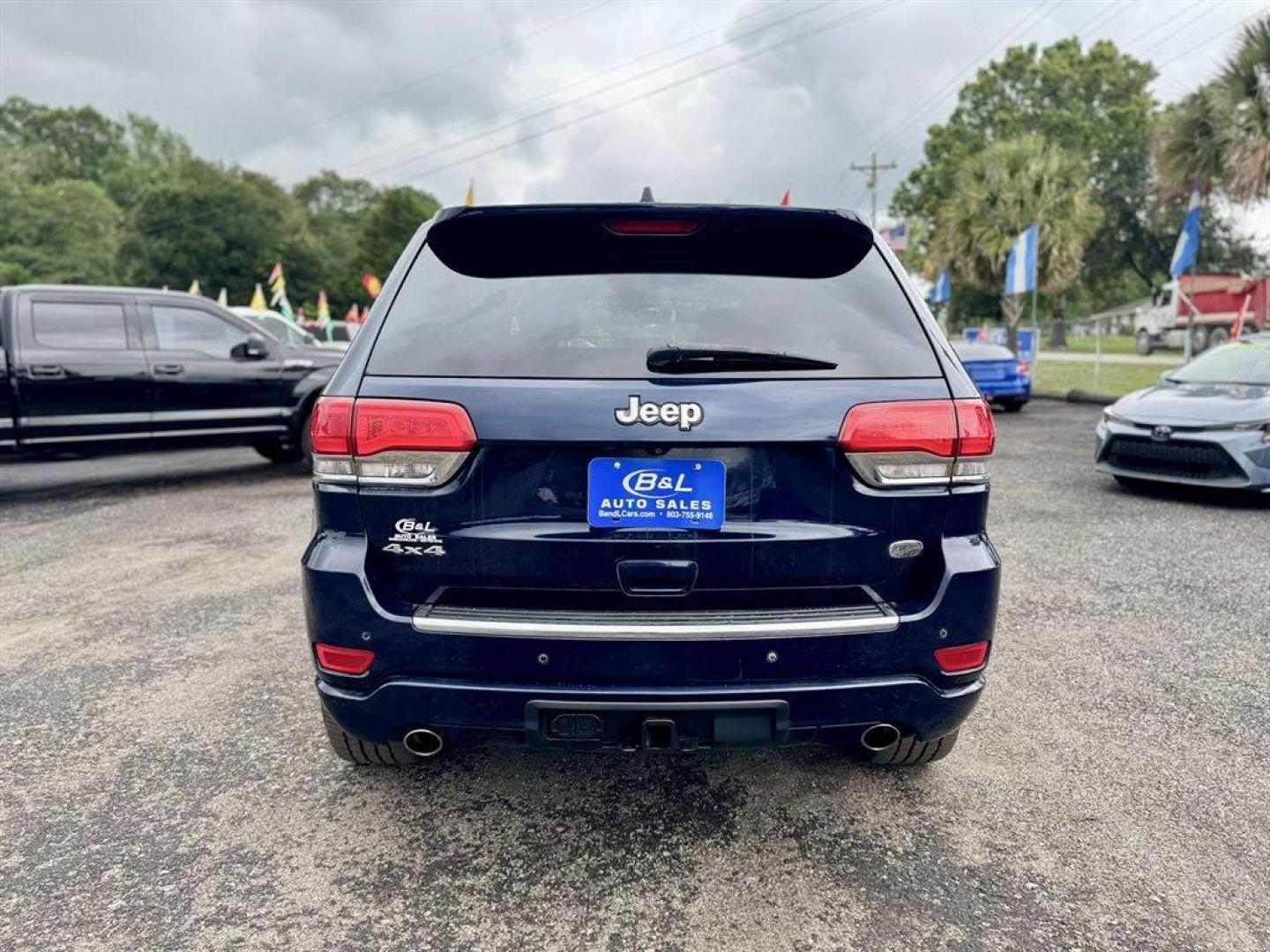 2014 Blue /Black Jeep Grand Cherokee (1C4RJFCG5EC) with an 3.6l V6 MPI Dohc VVT Flex engine, Automatic transmission, located at 745 East Steele Rd., West Columbia, SC, 29170, (803) 755-9148, 33.927212, -81.148483 - Special Internet Price! 2014 Jeep Grand Cherokee with AM/FM radio, Bluetooth, Backup camera, Navigation, Cruise control, Panoramic sunroof, Leather interior, Keyless entry, Push to start, Powered windows, Powered door locks, Plus more! - Photo#4