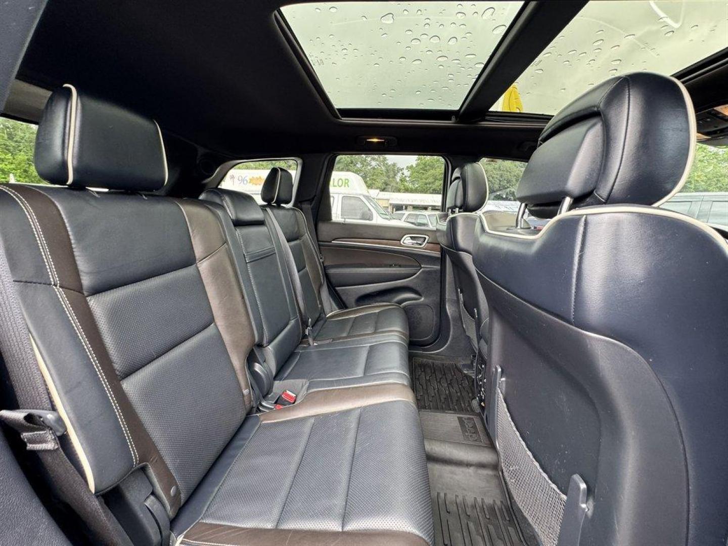 2014 Blue /Black Jeep Grand Cherokee (1C4RJFCG5EC) with an 3.6l V6 MPI Dohc VVT Flex engine, Automatic transmission, located at 745 East Steele Rd., West Columbia, SC, 29170, (803) 755-9148, 33.927212, -81.148483 - Special Internet Price! 2014 Jeep Grand Cherokee with AM/FM radio, Bluetooth, Backup camera, Navigation, Cruise control, Panoramic sunroof, Leather interior, Keyless entry, Push to start, Powered windows, Powered door locks, Plus more! - Photo#30