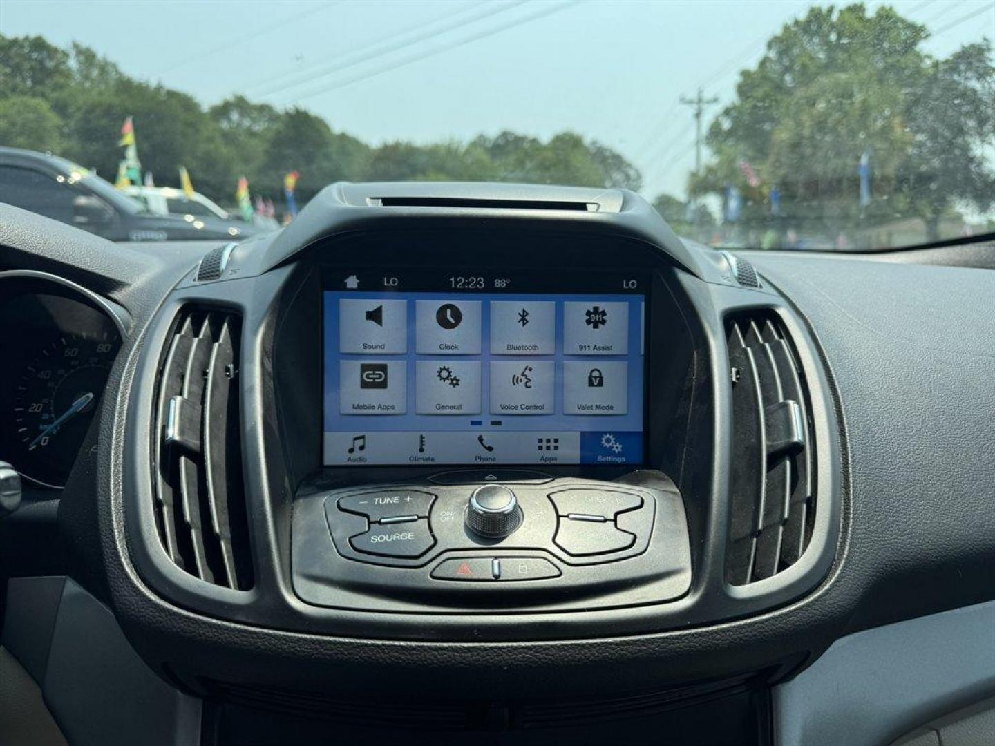 2016 Red /Taupe Ford Escape (1FMCU0GX3GU) with an 1.6l I-4 DI Dohc TC Ecobt engine, Automatic transmission, located at 745 East Steele Rd., West Columbia, SC, 29170, (803) 755-9148, 33.927212, -81.148483 - Special Internet Price! 2016 Ford Escape with AM/FM radio, Bluetooth, Backup camera, Keyless entry, Cloth interior, Powered windows, Powered door locks, Plus more! - Photo#12