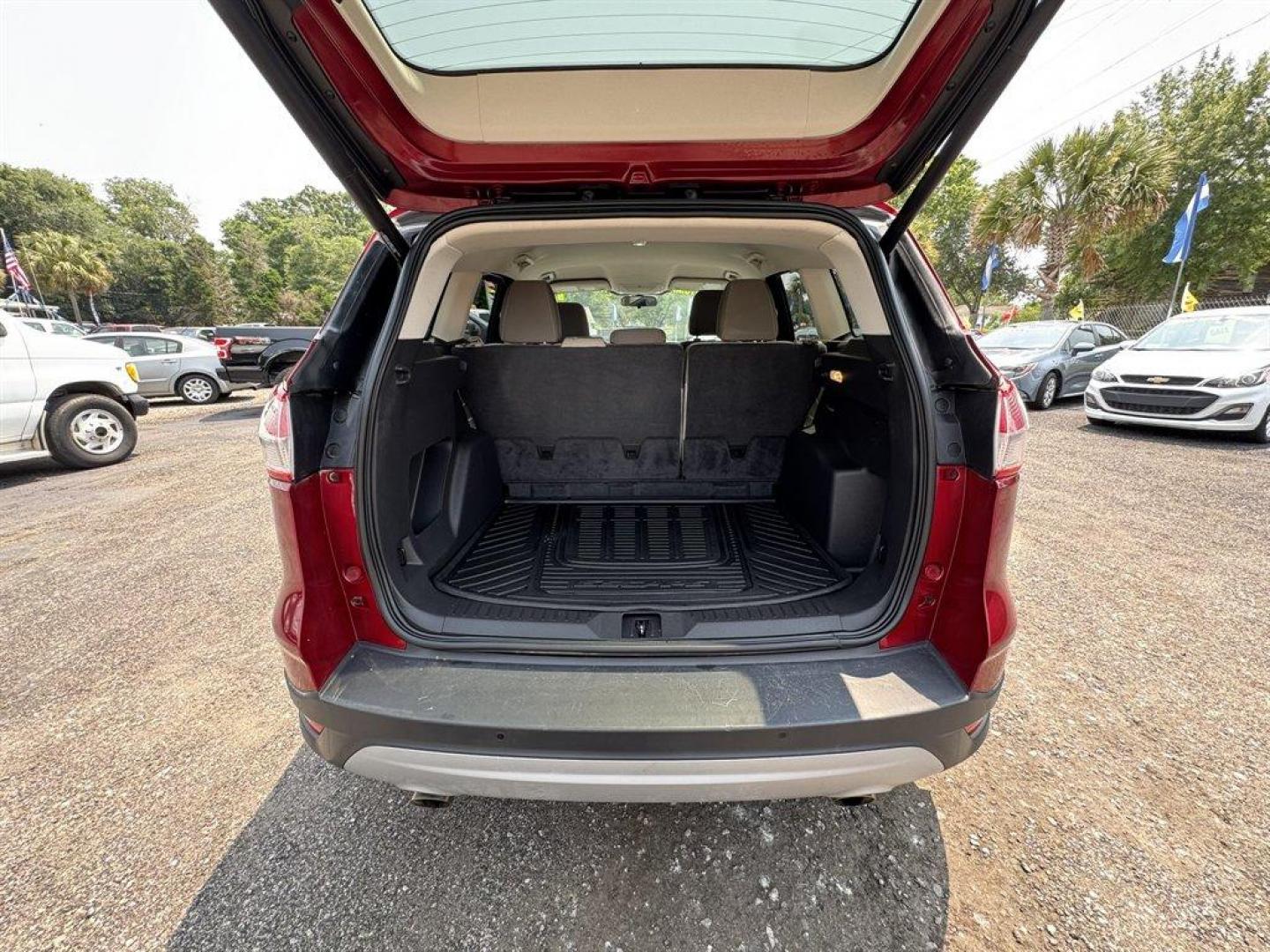 2016 Red /Taupe Ford Escape (1FMCU0GX3GU) with an 1.6l I-4 DI Dohc TC Ecobt engine, Automatic transmission, located at 745 East Steele Rd., West Columbia, SC, 29170, (803) 755-9148, 33.927212, -81.148483 - Special Internet Price! 2016 Ford Escape with AM/FM radio, Bluetooth, Backup camera, Keyless entry, Cloth interior, Powered windows, Powered door locks, Plus more! - Photo#28