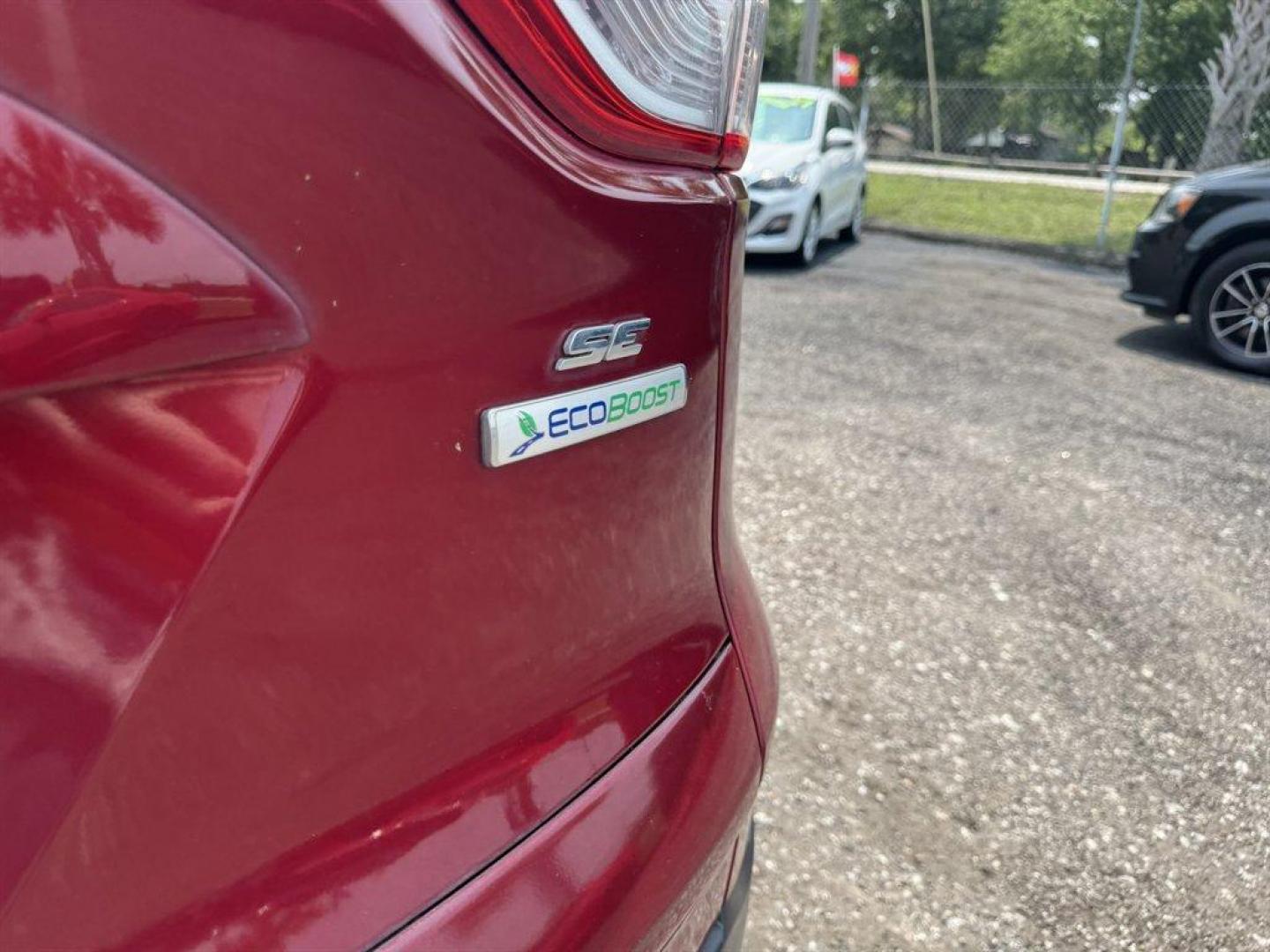 2016 Red /Taupe Ford Escape (1FMCU0GX3GU) with an 1.6l I-4 DI Dohc TC Ecobt engine, Automatic transmission, located at 745 East Steele Rd., West Columbia, SC, 29170, (803) 755-9148, 33.927212, -81.148483 - Special Internet Price! 2016 Ford Escape with AM/FM radio, Bluetooth, Backup camera, Keyless entry, Cloth interior, Powered windows, Powered door locks, Plus more! - Photo#30