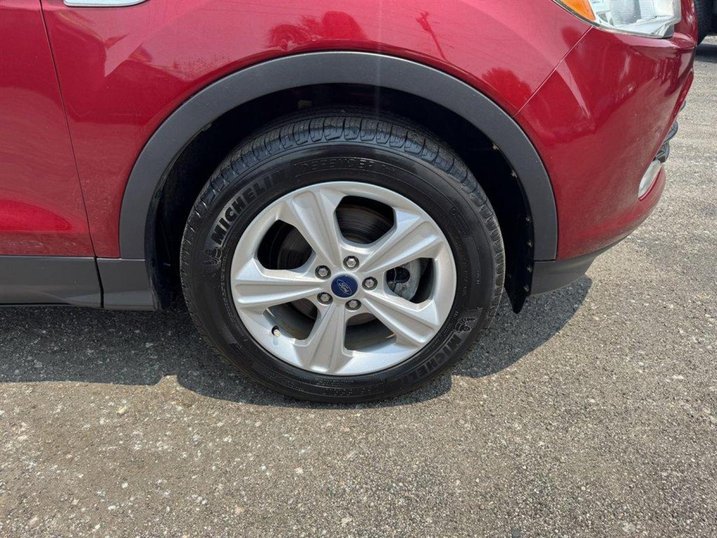 2016 Red /Taupe Ford Escape (1FMCU0GX3GU) with an 1.6l I-4 DI Dohc TC Ecobt engine, Automatic transmission, located at 745 East Steele Rd., West Columbia, SC, 29170, (803) 755-9148, 33.927212, -81.148483 - Special Internet Price! 2016 Ford Escape with AM/FM radio, Bluetooth, Backup camera, Keyless entry, Cloth interior, Powered windows, Powered door locks, Plus more! - Photo#31