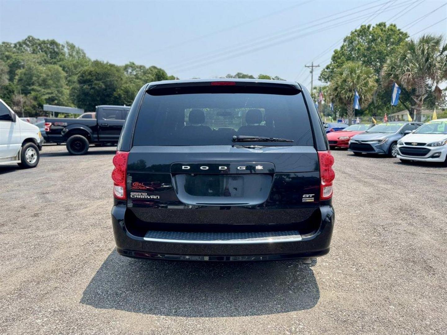 2017 Black /Black Dodge Grand Caravan (2C4RDGEG2HR) with an 3.6l V6 MPI Dohc VVT Flex engine, Automatic transmission, located at 745 East Steele Rd., West Columbia, SC, 29170, (803) 755-9148, 33.927212, -81.148483 - Special Internet Price! 2017 Dodge Grand Caravan with AM/FM radio, Bluetooth, Cruise control, Leather interior, 3rd row seating, Powered liftgate, Powered windows, Powered door locks, Plus more! - Photo#4