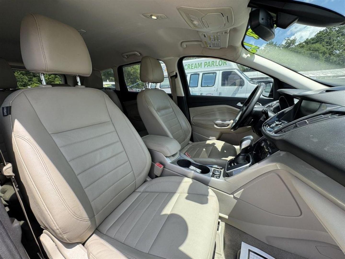 2013 Burgundy /Taupe Ford Escape (1FMCU0HX5DU) with an 1.6l I-4 DI Dohc TC Ecobt engine, Automatic transmission, located at 745 East Steele Rd., West Columbia, SC, 29170, (803) 755-9148, 33.927212, -81.148483 - Special Internet Price! 2013 Ford Escape with AM/FM radio, Navigation, Cruise control, Push to start, Keyless entry, Leather interior, Powered liftgate, Powered windows, Powered door locks, Plus more! - Photo#27