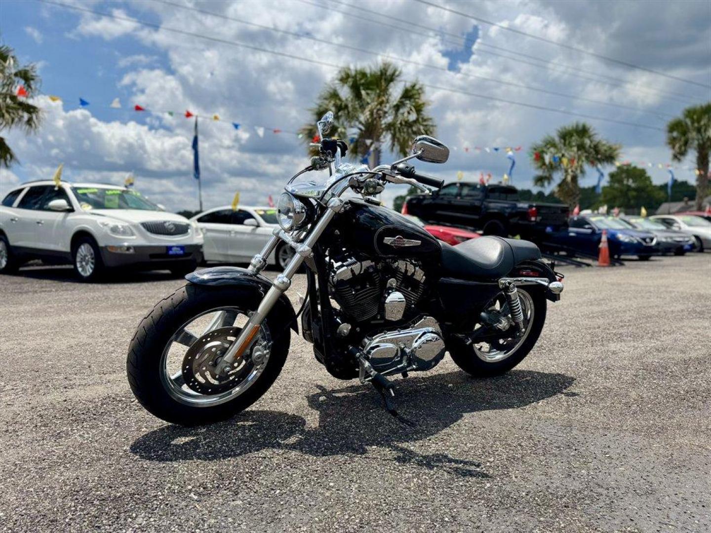 2013 Black /Black Harley-Davidson 1200 Custom (1HD1CT315DC) with an 1200 engine, 6 Speed Manual transmission, located at 745 East Steele Rd., West Columbia, SC, 29170, (803) 755-9148, 33.927212, -81.148483 - Photo#0