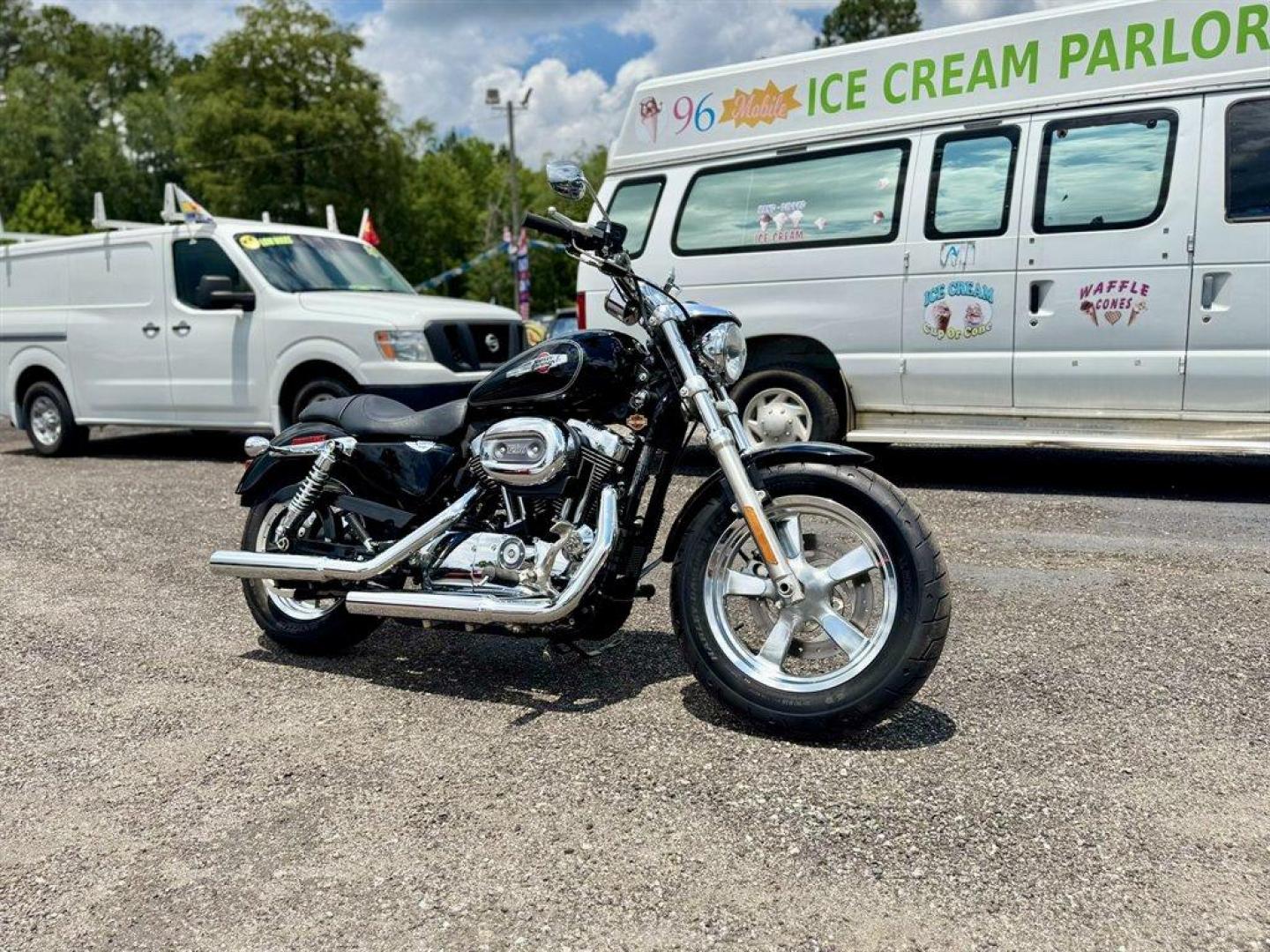 2013 Black /Black Harley-Davidson 1200 Custom (1HD1CT315DC) with an 1200 engine, 6 Speed Manual transmission, located at 745 East Steele Rd., West Columbia, SC, 29170, (803) 755-9148, 33.927212, -81.148483 - Photo#2