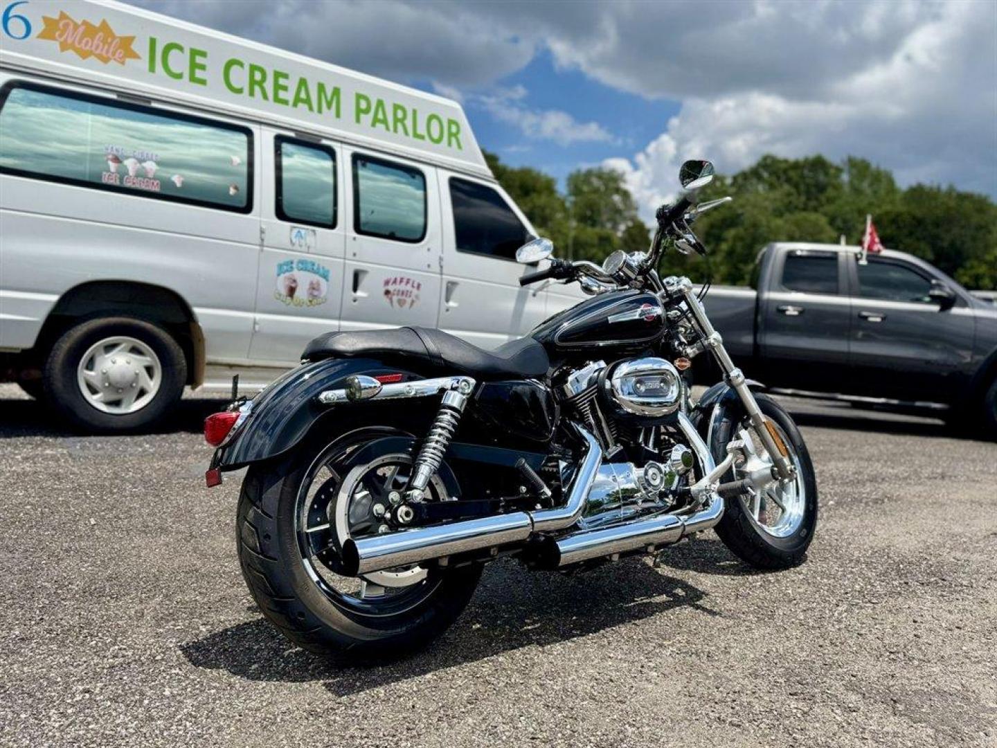 2013 Black /Black Harley-Davidson 1200 Custom (1HD1CT315DC) with an 1200 engine, 6 Speed Manual transmission, located at 745 East Steele Rd., West Columbia, SC, 29170, (803) 755-9148, 33.927212, -81.148483 - Photo#3