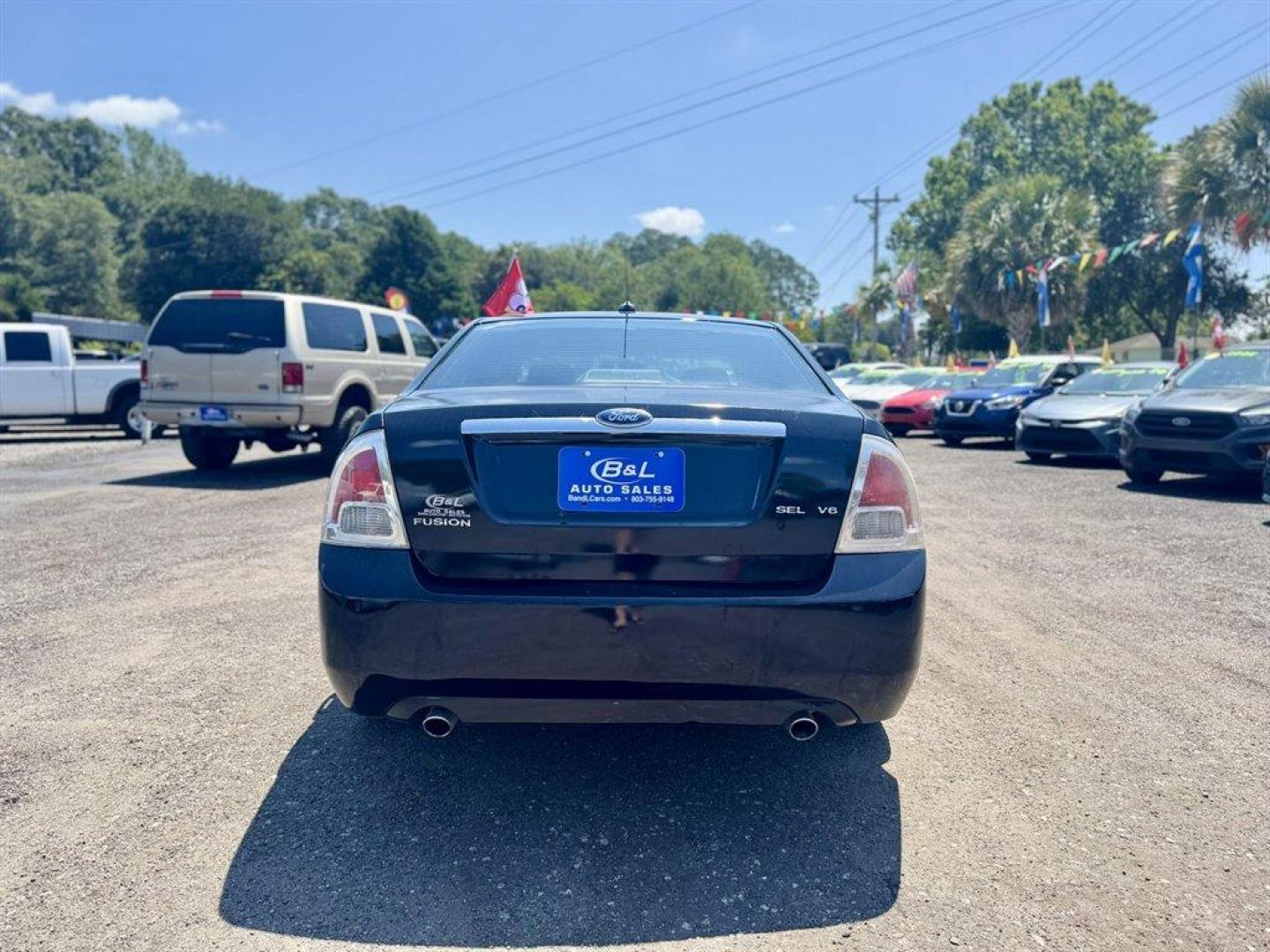 2009 Black /Black Ford Fusion (3FAHP08119R) with an 3.0l V6 EFI 3.0l engine, Automatic transmission, located at 745 East Steele Rd., West Columbia, SC, 29170, (803) 755-9148, 33.927212, -81.148483 - Special Internet Price! 2009 Ford Fusion with AM/FM radio, Cruise control, Sunroof, Leather interior, Powered windows, Powered door locks, Plus more! - Photo#4