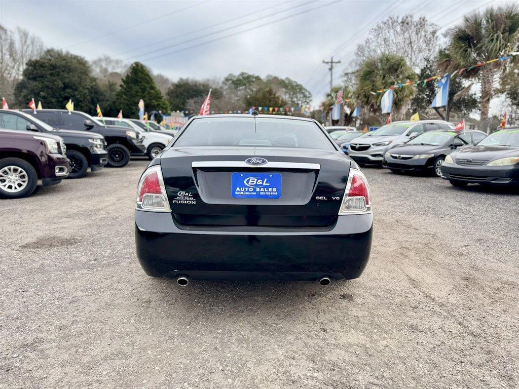 2009 Black /Black Ford Fusion (3FAHP08119R) with an 3.0l V6 EFI 3.0l engine, Automatic transmission, located at 745 East Steele Rd., West Columbia, SC, 29170, (803) 755-9148, 33.927212, -81.148483 - Photo#4