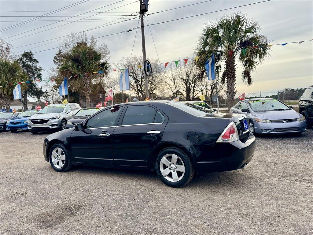 2009 Black /Black Ford Fusion (3FAHP08119R) with an 3.0l V6 EFI 3.0l engine, Automatic transmission, located at 745 East Steele Rd., West Columbia, SC, 29170, (803) 755-9148, 33.927212, -81.148483 - Photo#5