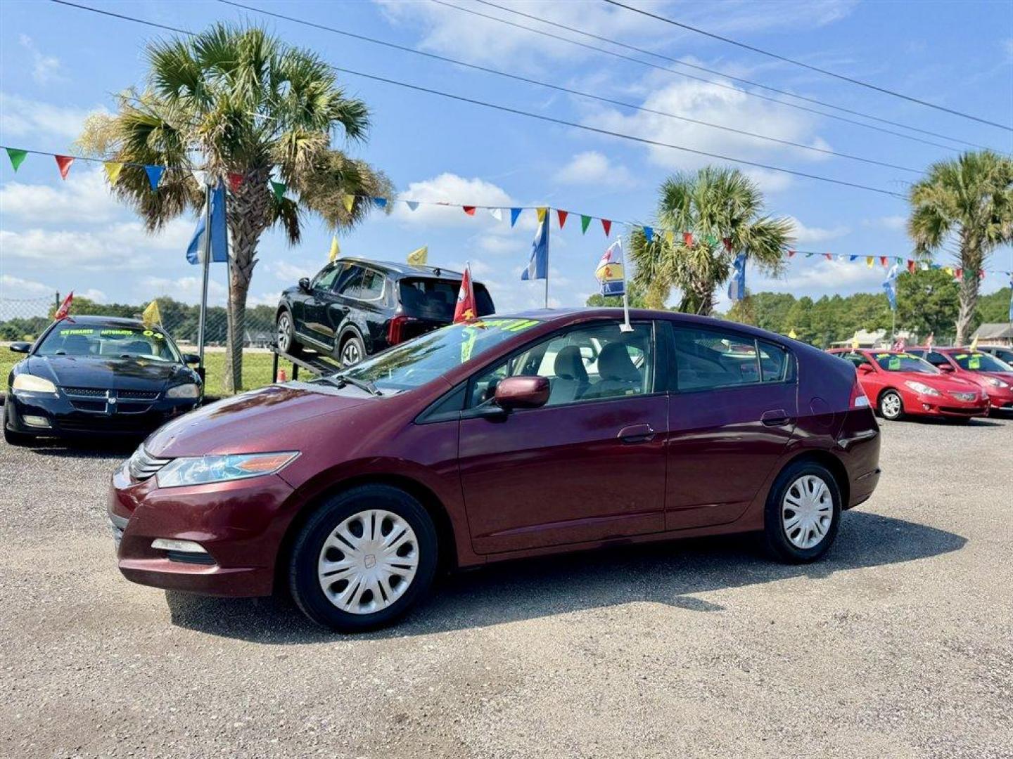 2011 Burgundy /Grey Honda Insight (JHMZE2H30BS) with an 1.3l I4 MPI Sohc HYB Ivtc engine, Automatic transmission, located at 745 East Steele Rd., West Columbia, SC, 29170, (803) 755-9148, 33.927212, -81.148483 - Special Internet Price! 2011 Honda Insight with AM/FM radio, Cruise control, Cloth interior, Powered windows, Powered door locks, Plus more! - Photo#0