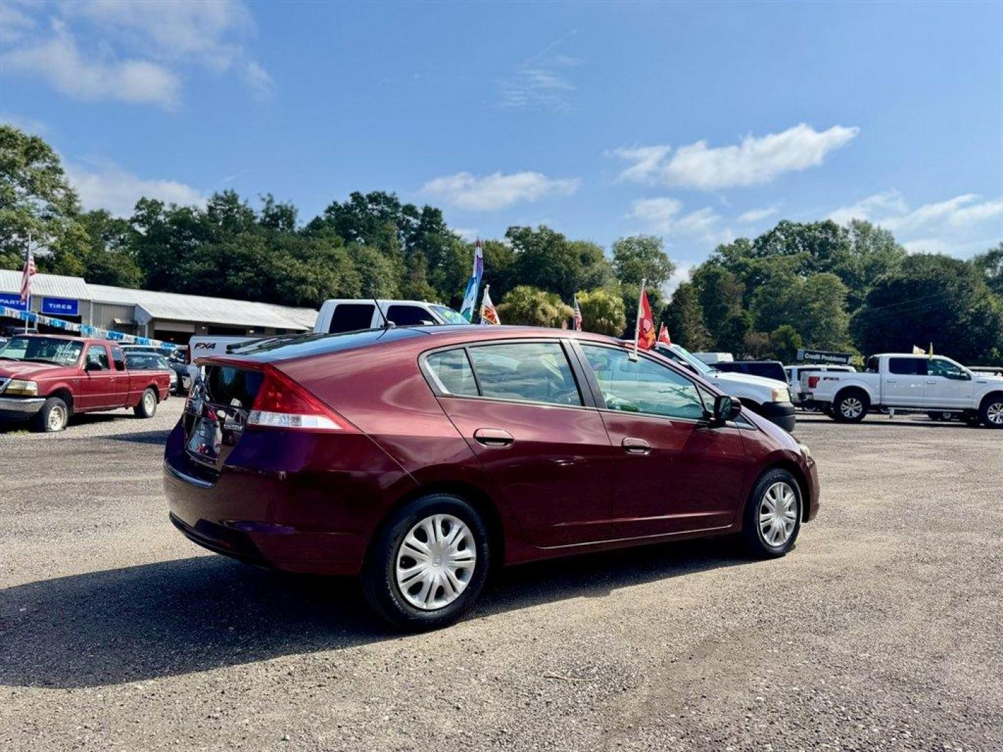 2011 Burgundy /Grey Honda Insight (JHMZE2H30BS) with an 1.3l I4 MPI Sohc HYB Ivtc engine, Automatic transmission, located at 745 East Steele Rd., West Columbia, SC, 29170, (803) 755-9148, 33.927212, -81.148483 - Special Internet Price! 2011 Honda Insight with AM/FM radio, Cruise control, Cloth interior, Powered windows, Powered door locks, Plus more! - Photo#3
