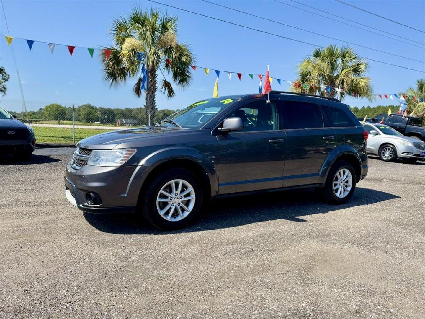 2014 Grey /Black Dodge Journey (3C4PDCBG7ET) with an 3.6l V6 MPI Dohc VVT Flex engine, Automatic transmission, located at 745 East Steele Rd., West Columbia, SC, 29170, (803) 755-9148, 33.927212, -81.148483 - Special Internet Price! 2014 Dodge Journey with AM/FM radio, Bluetooth, Cruise control, Push to start, Keyless entry, Cloth interior, Powered windows, Powered door locks, Plus more! - Photo#0