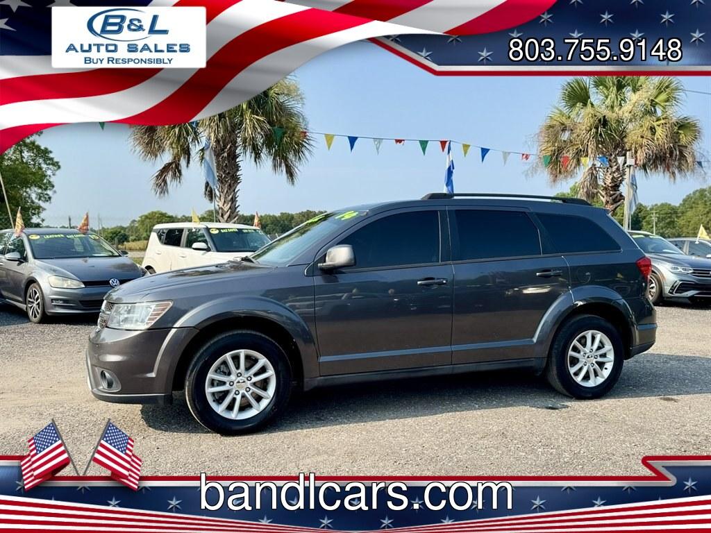 2014 Grey /Black Dodge Journey (3C4PDCBG7ET) with an 3.6l V6 MPI Dohc VVT Flex engine, Automatic transmission, located at 745 East Steele Rd., West Columbia, SC, 29170, (803) 755-9148, 33.927212, -81.148483- Photo#0