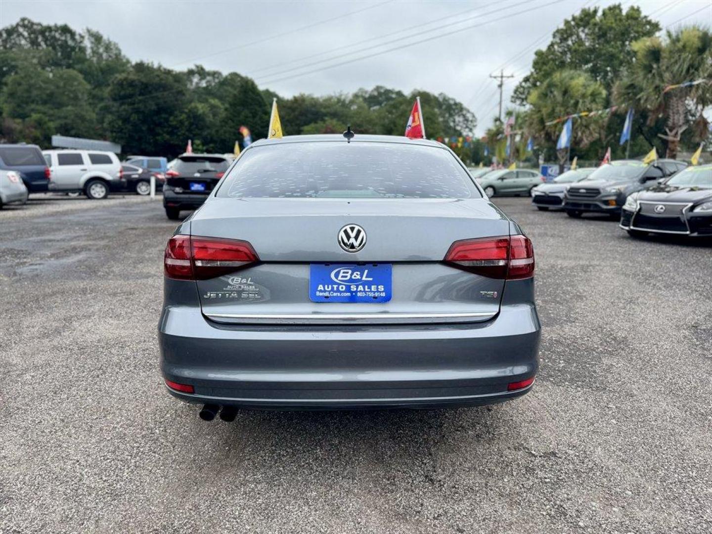 2017 Grey /Black Volkswagen Jetta (3VWL17AJ7HM) with an 1.8l I-4 DI Dohc T/C 1.8l engine, Automatic transmission, located at 745 East Steele Rd., West Columbia, SC, 29170, (803) 755-9148, 33.927212, -81.148483 - Special Internet Price! 2017 Volkswagen Jetta with AM/FM radio, Backup camera, Navigation, Cruise control, Sunroof, Keyless entry, Push to start, Leather interior, Powered windows, Powered door locks, Plus more! - Photo#4