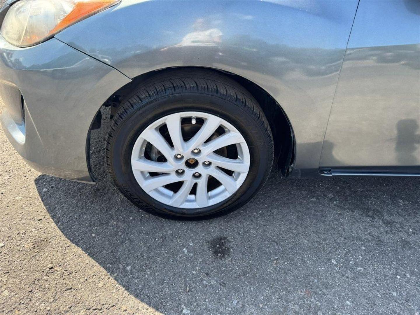 2012 Turquoise /Black Mazda Mazda3 (JM1BL1V76C1) with an 2.0l I-4 DI Dohc 2.0l engine, Automatic transmission, located at 745 East Steele Rd., West Columbia, SC, 29170, (803) 755-9148, 33.927212, -81.148483 - Special Internet Price! 2012 Mazda Mazda3 - Photo#27