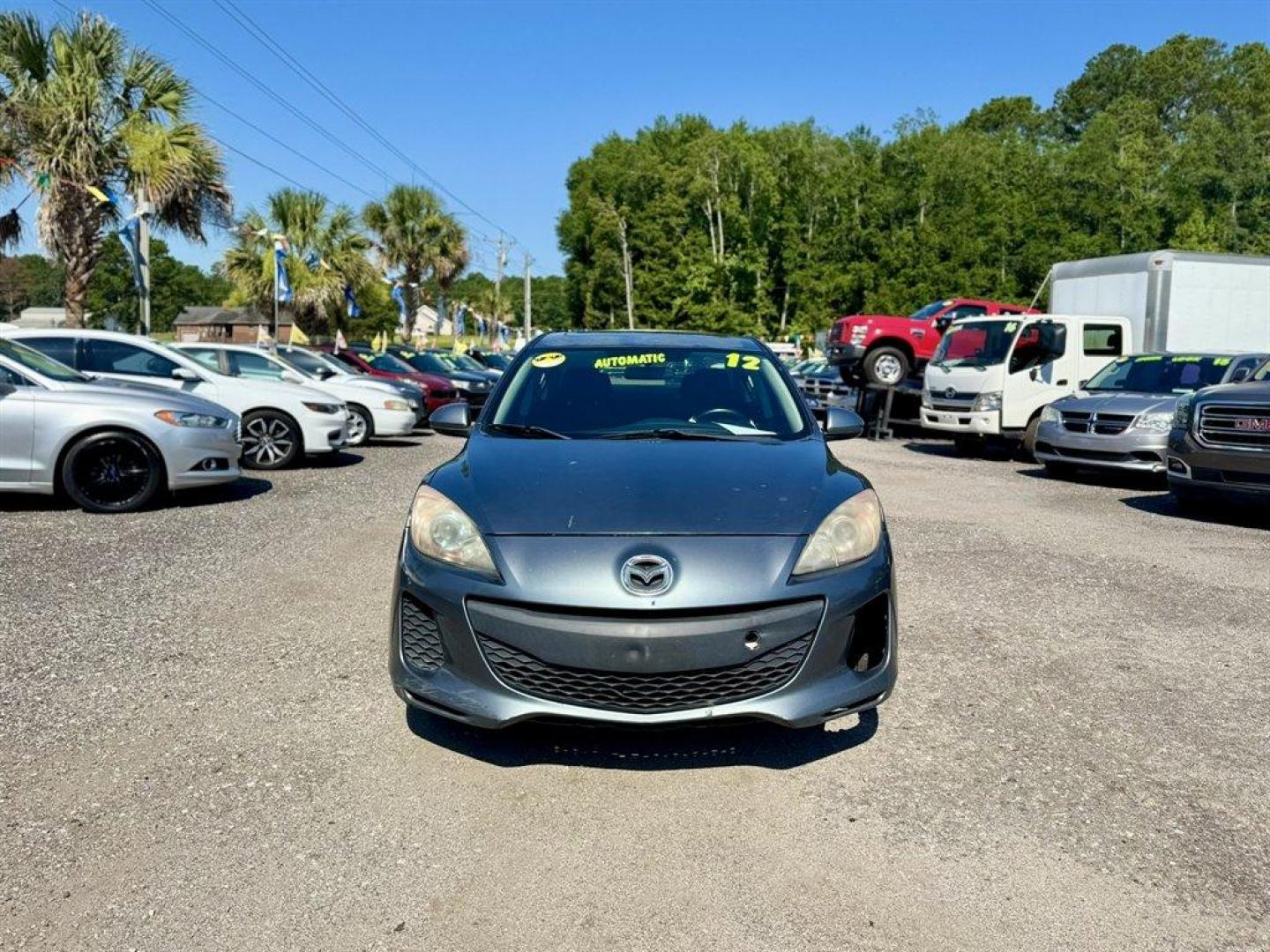 2012 Turquoise /Black Mazda Mazda3 (JM1BL1V76C1) with an 2.0l I-4 DI Dohc 2.0l engine, Automatic transmission, located at 745 East Steele Rd., West Columbia, SC, 29170, (803) 755-9148, 33.927212, -81.148483- Photo#1