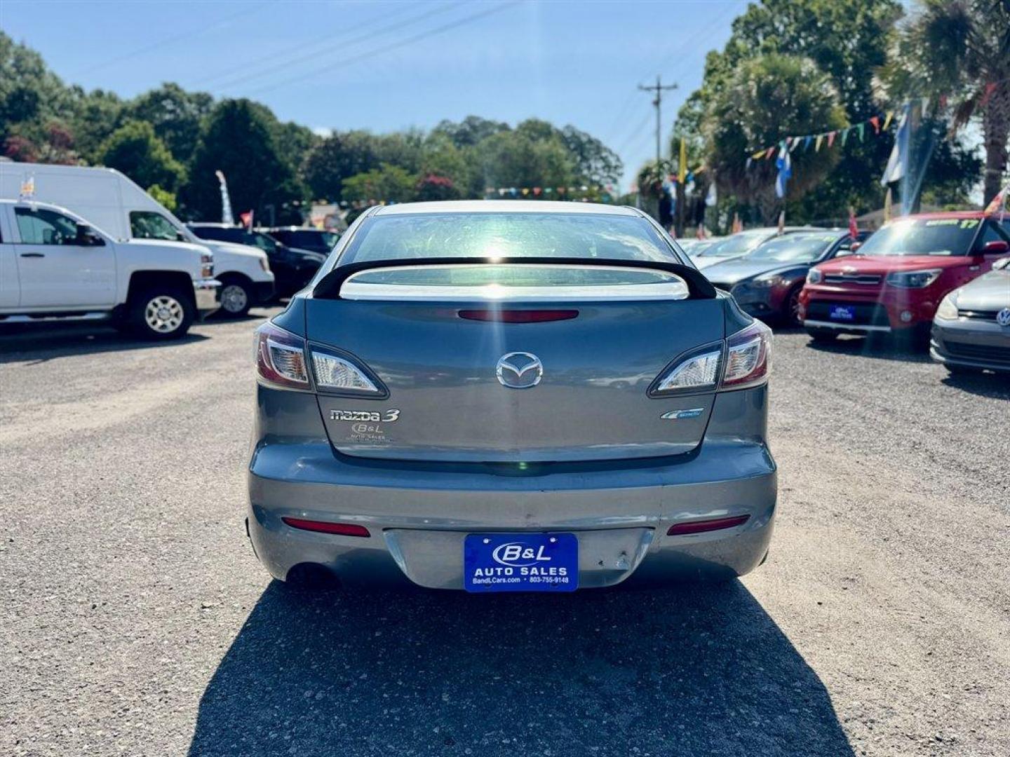 2012 Turquoise /Black Mazda Mazda3 (JM1BL1V76C1) with an 2.0l I-4 DI Dohc 2.0l engine, Automatic transmission, located at 745 East Steele Rd., West Columbia, SC, 29170, (803) 755-9148, 33.927212, -81.148483- Photo#4