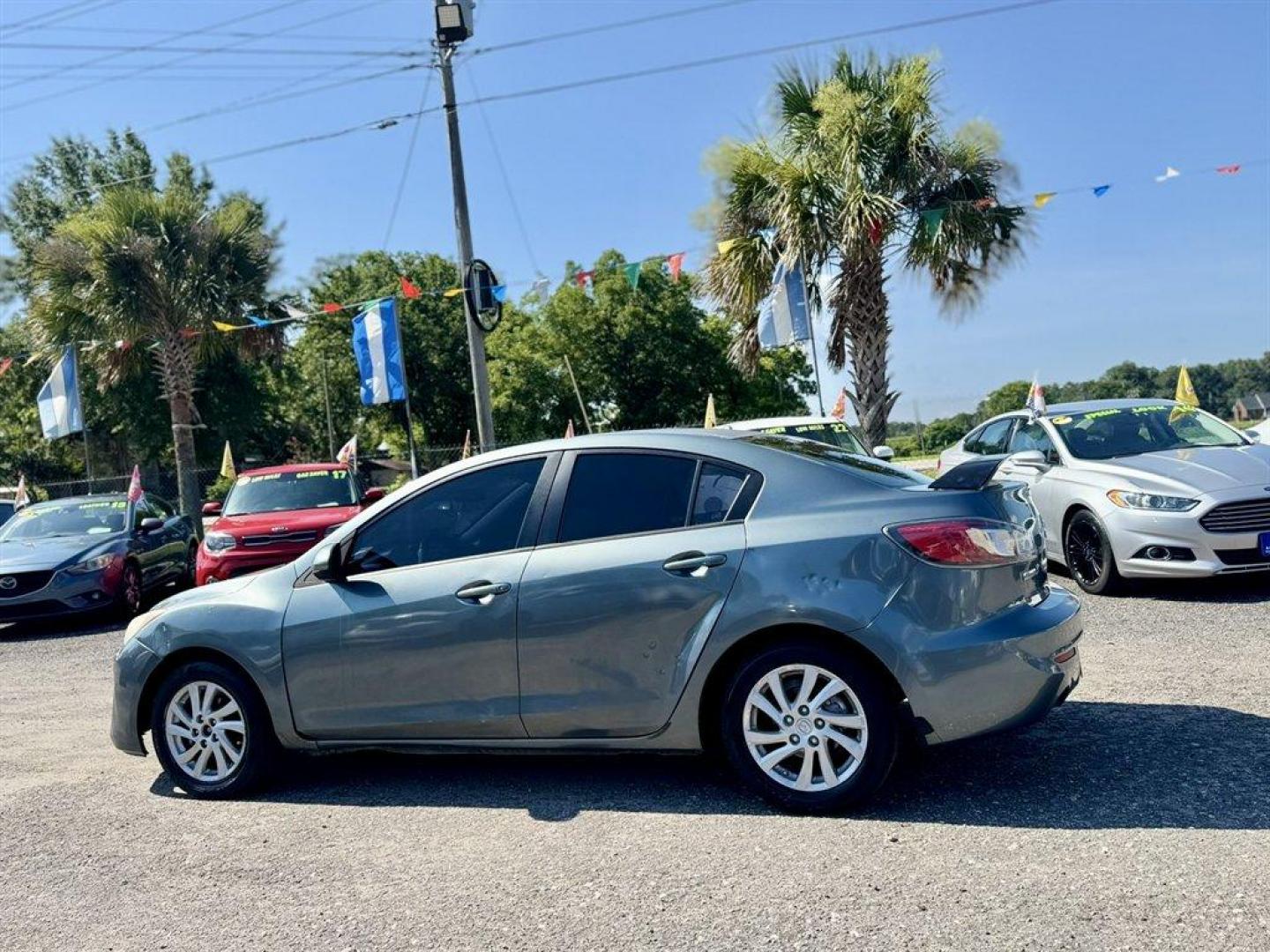 2012 Turquoise /Black Mazda Mazda3 (JM1BL1V76C1) with an 2.0l I-4 DI Dohc 2.0l engine, Automatic transmission, located at 745 East Steele Rd., West Columbia, SC, 29170, (803) 755-9148, 33.927212, -81.148483- Photo#5