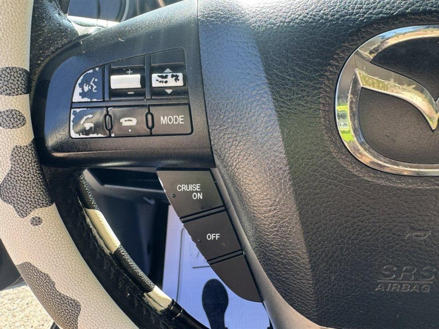 2012 Turquoise /Black Mazda Mazda3 (JM1BL1V76C1) with an 2.0l I-4 DI Dohc 2.0l engine, Automatic transmission, located at 745 East Steele Rd., West Columbia, SC, 29170, (803) 755-9148, 33.927212, -81.148483- Photo#7