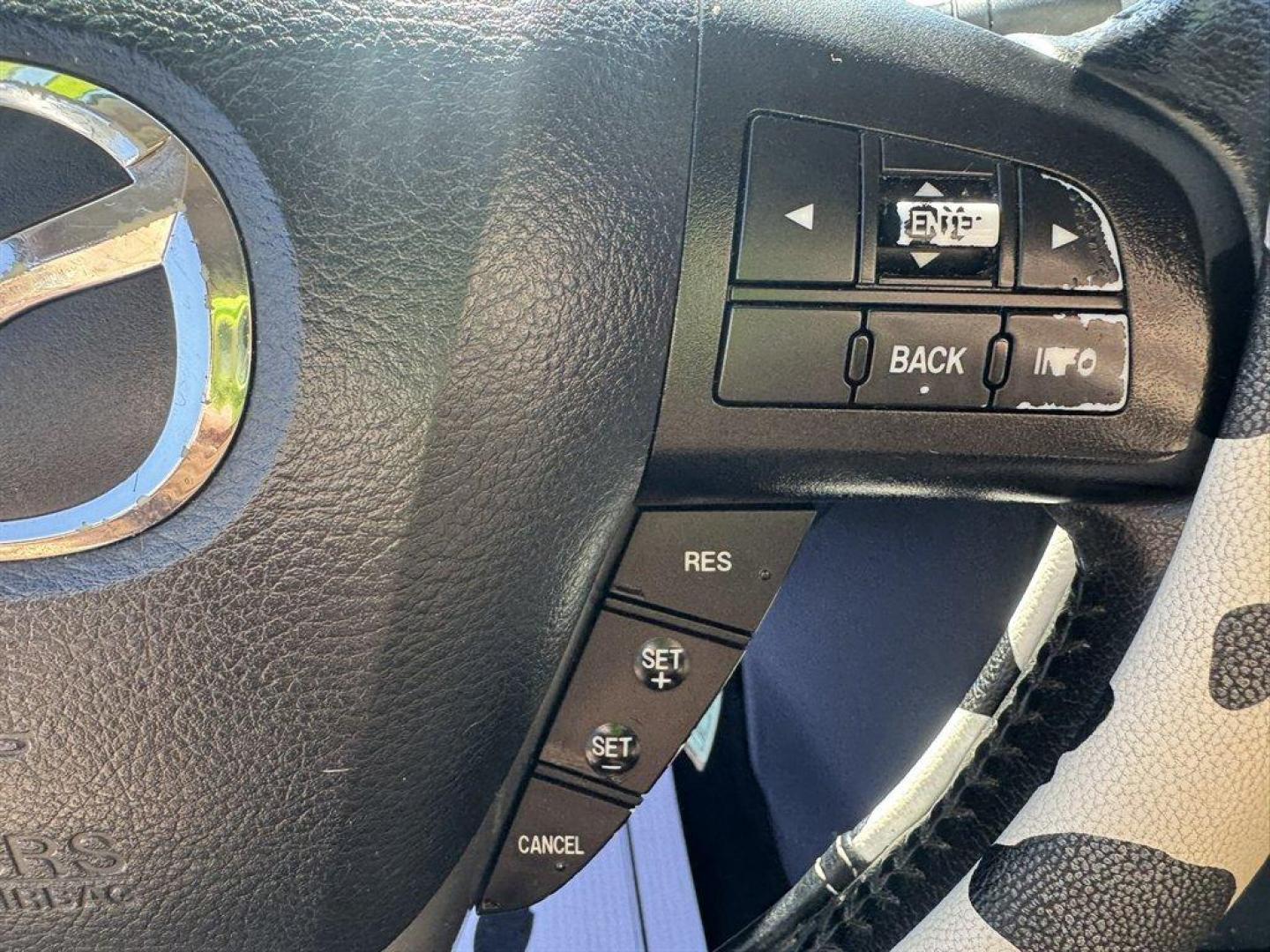 2012 Turquoise /Black Mazda Mazda3 (JM1BL1V76C1) with an 2.0l I-4 DI Dohc 2.0l engine, Automatic transmission, located at 745 East Steele Rd., West Columbia, SC, 29170, (803) 755-9148, 33.927212, -81.148483- Photo#8