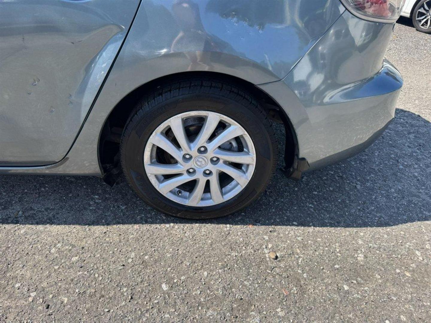 2012 Turquoise /Black Mazda Mazda3 (JM1BL1V76C1) with an 2.0l I-4 DI Dohc 2.0l engine, Automatic transmission, located at 745 East Steele Rd., West Columbia, SC, 29170, (803) 755-9148, 33.927212, -81.148483- Photo#21