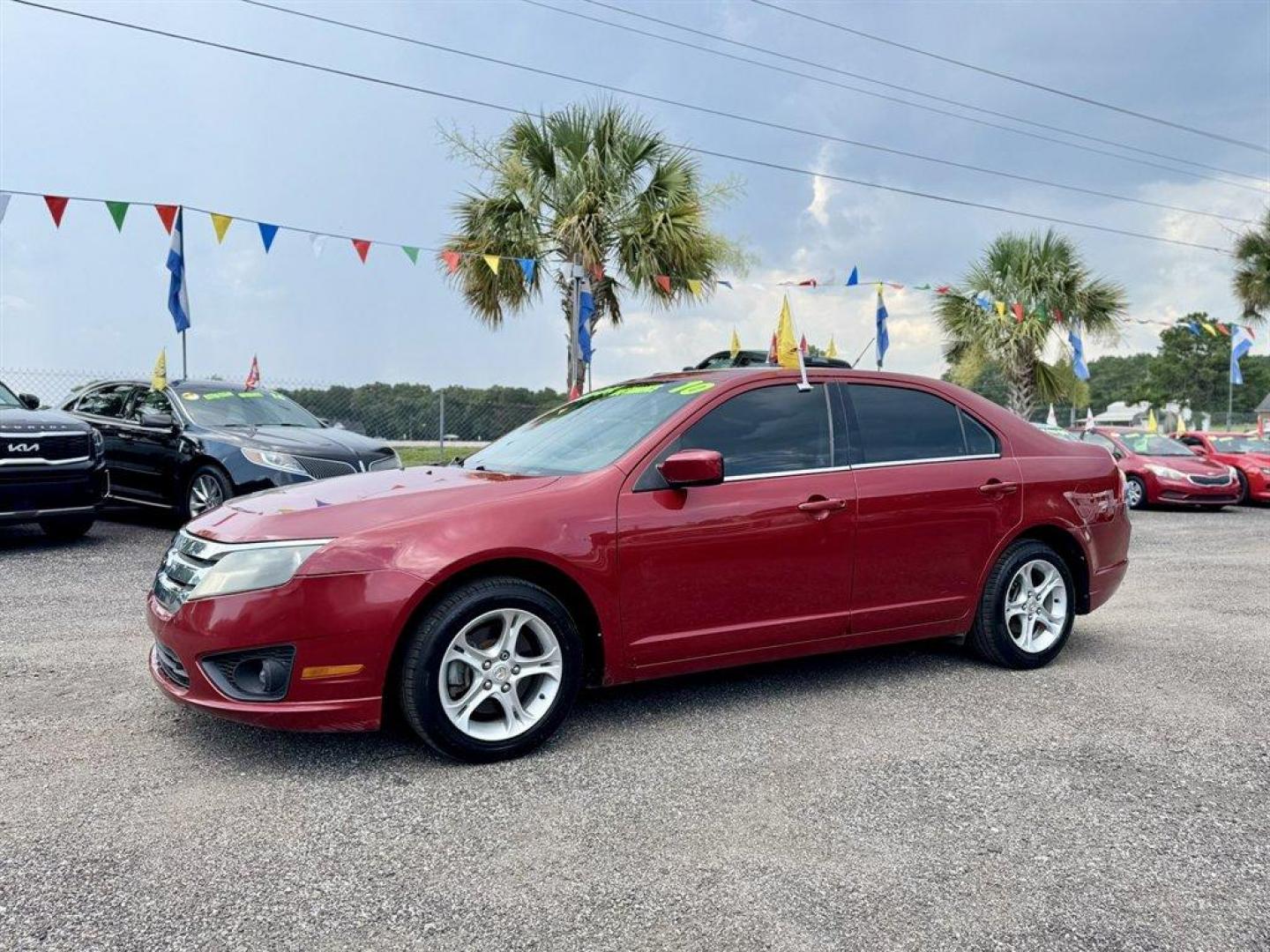 2010 Red /Black Ford Fusion (3FAHP0HAXAR) with an 2.5l I-4 Smpi Dohc 2.5l engine, Automatic transmission, located at 745 East Steele Rd., West Columbia, SC, 29170, (803) 755-9148, 33.927212, -81.148483 - Special Internet Price! 2010 Ford Fusion with AM/FM radio, Cruise control, Cloth interior, Powered windows, Powered door locks, Plus more! - Photo#0