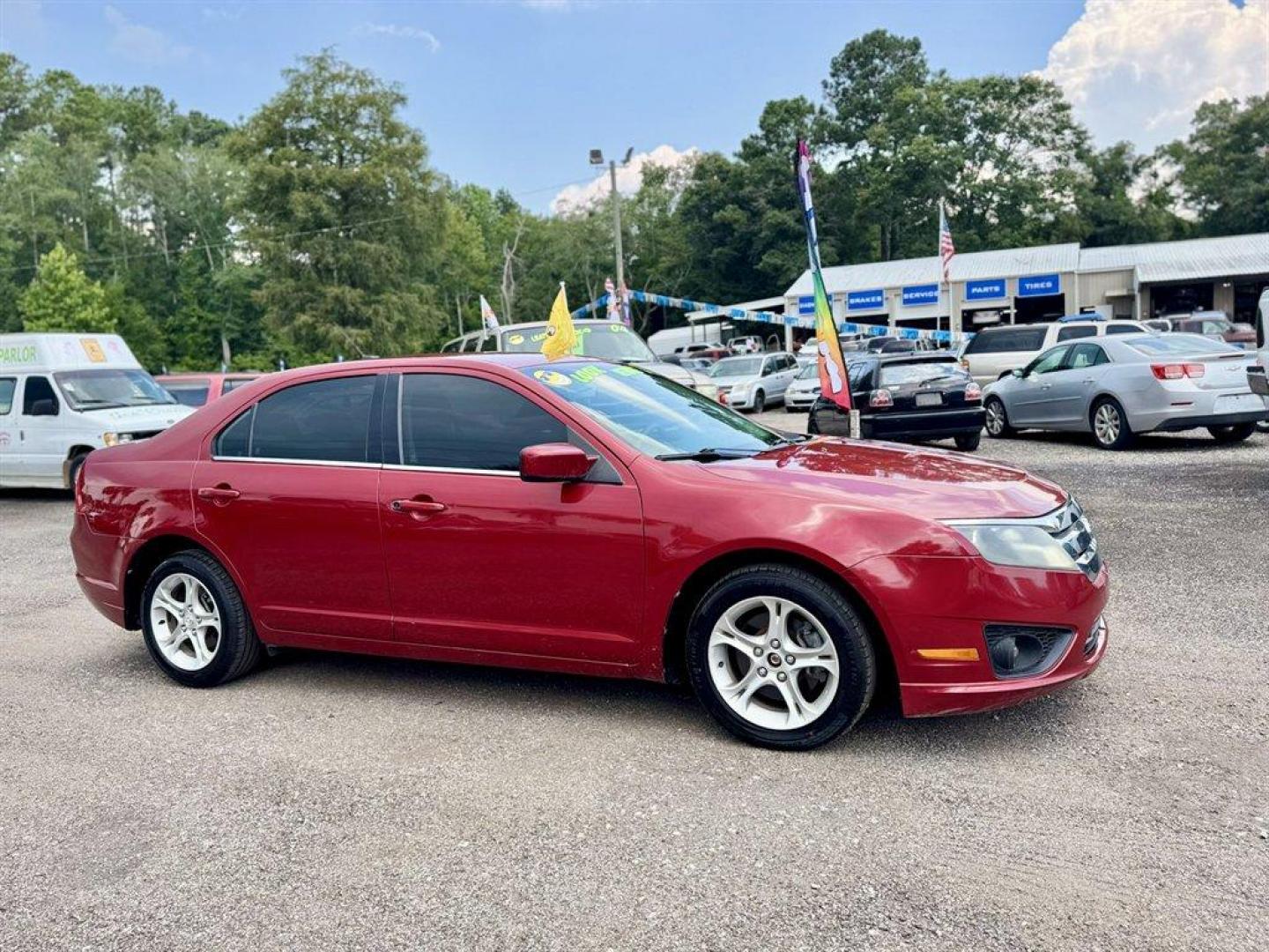 2010 Red /Black Ford Fusion (3FAHP0HAXAR) with an 2.5l I-4 Smpi Dohc 2.5l engine, Automatic transmission, located at 745 East Steele Rd., West Columbia, SC, 29170, (803) 755-9148, 33.927212, -81.148483 - Special Internet Price! 2010 Ford Fusion with AM/FM radio, Cruise control, Cloth interior, Powered windows, Powered door locks, Plus more! - Photo#2
