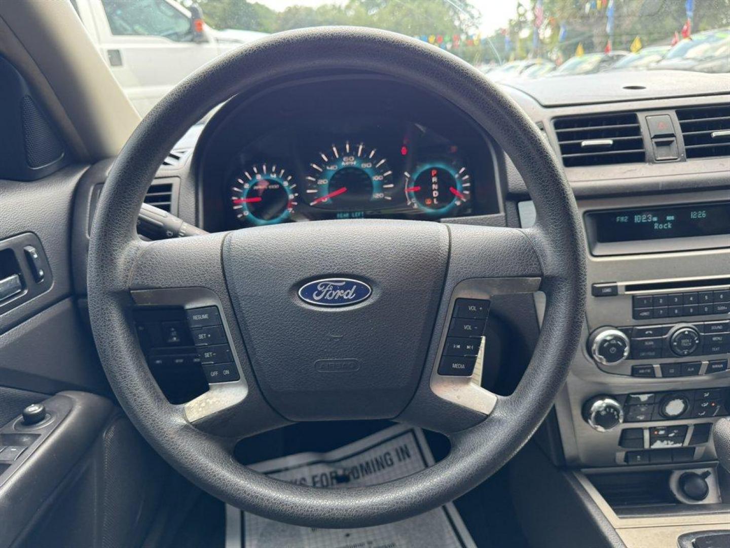 2010 Red /Black Ford Fusion (3FAHP0HAXAR) with an 2.5l I-4 Smpi Dohc 2.5l engine, Automatic transmission, located at 745 East Steele Rd., West Columbia, SC, 29170, (803) 755-9148, 33.927212, -81.148483 - Special Internet Price! 2010 Ford Fusion with AM/FM radio, Cruise control, Cloth interior, Powered windows, Powered door locks, Plus more! - Photo#7