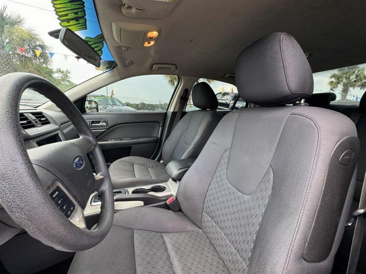 2010 Red /Black Ford Fusion (3FAHP0HAXAR) with an 2.5l I-4 Smpi Dohc 2.5l engine, Automatic transmission, located at 745 East Steele Rd., West Columbia, SC, 29170, (803) 755-9148, 33.927212, -81.148483 - Special Internet Price! 2010 Ford Fusion with AM/FM radio, Cruise control, Cloth interior, Powered windows, Powered door locks, Plus more! - Photo#19