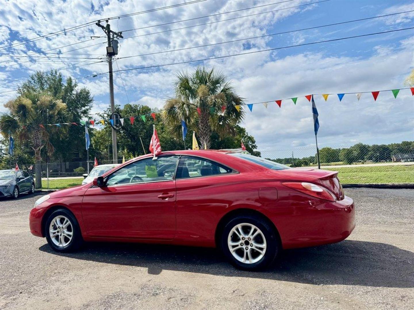 2004 Red /Grey Toyota Camry Solara (4T1CE38P14U) with an 2.4l I-4 SFI Dohc 2.4l engine, Automatic transmission, located at 745 East Steele Rd., West Columbia, SC, 29170, (803) 755-9148, 33.927212, -81.148483 - Special Internet Price! 2004 Toyota Camry Solara with AM/FM radio, Sunroof, Cloth interior, Powered windows, Powered door locks, Plus more! - Photo#3