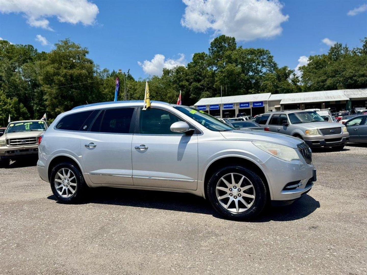 2013 Silver /Black Buick Enclave (5GAKRCKD3DJ) with an 3.6l V6 DI Dohc 3.6l engine, Automatic transmission, located at 745 East Steele Rd., West Columbia, SC, 29170, (803) 755-9148, 33.927212, -81.148483 - Special Internet Price! 2013 Buick Enclave with AM/FM radio, Backup camera, Cruise control, Keyless entry, Sunroof, Leather interior, Powered front seats, 3rd row seating, Powered liftgate, Powered windows, Powered door locks, Plus more! - Photo#2