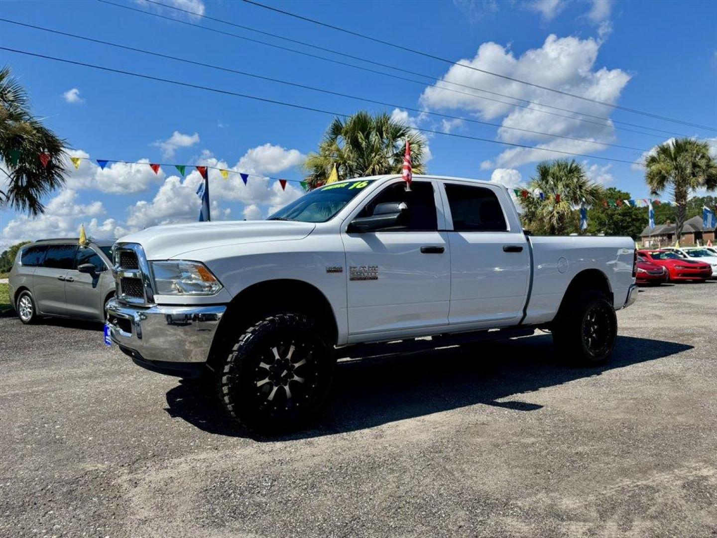 2016 White /Black Ram 2500 (3C6UR5CJ6GG) with an 6.4l V8 Smpi OHC 6.4l engine, Automatic transmission, located at 745 East Steele Rd., West Columbia, SC, 29170, (803) 755-9148, 33.927212, -81.148483 - Special Internet Price! 2016 Ram 2500 with AM/FM radio, 4X4, Cruise control, Leather interior, Seats 6, Keyless entry, Powered windows, Powered door locks, Plus more! - Photo#0
