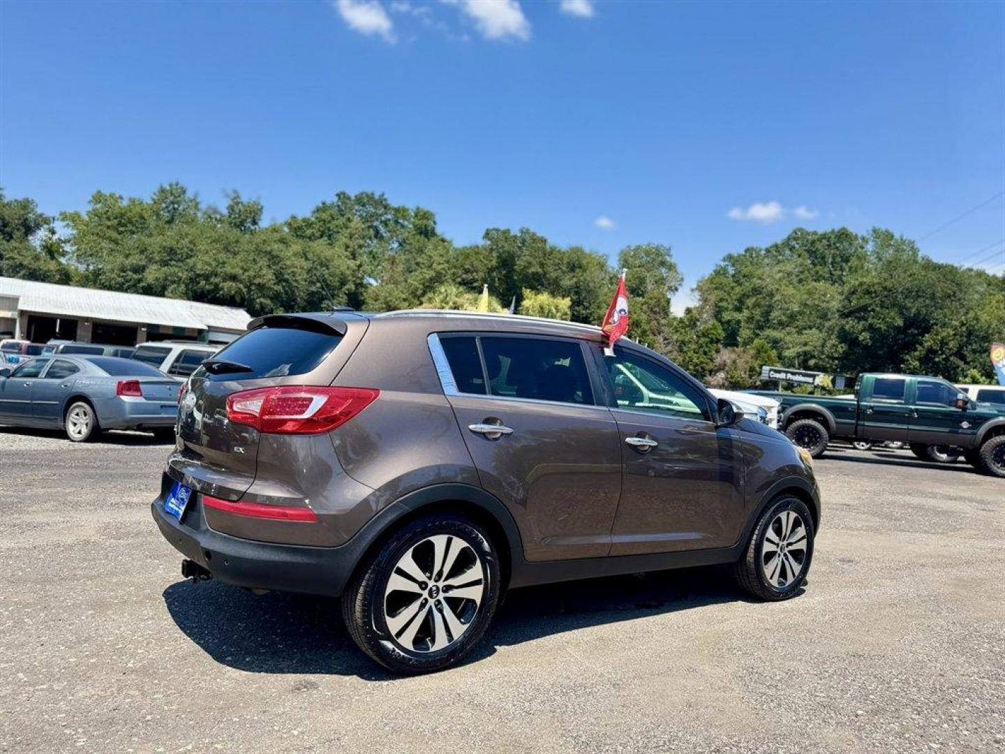 2013 Bronze /Bronze Kia Sportage (KNDPC3A22D7) with an 2.4l I-4 MPI Dohc Cvvt 2. engine, Automatic transmission, located at 745 East Steele Rd., West Columbia, SC, 29170, (803) 755-9148, 33.927212, -81.148483 - Special Interent Price! 2013 Kia Sportage with AM/FM radio, Bluetooth, Sunroof, Backup camera, Leather interior, Keyless entry, Push to start, Powered windows, Powered door locks, Plus more! - Photo#3