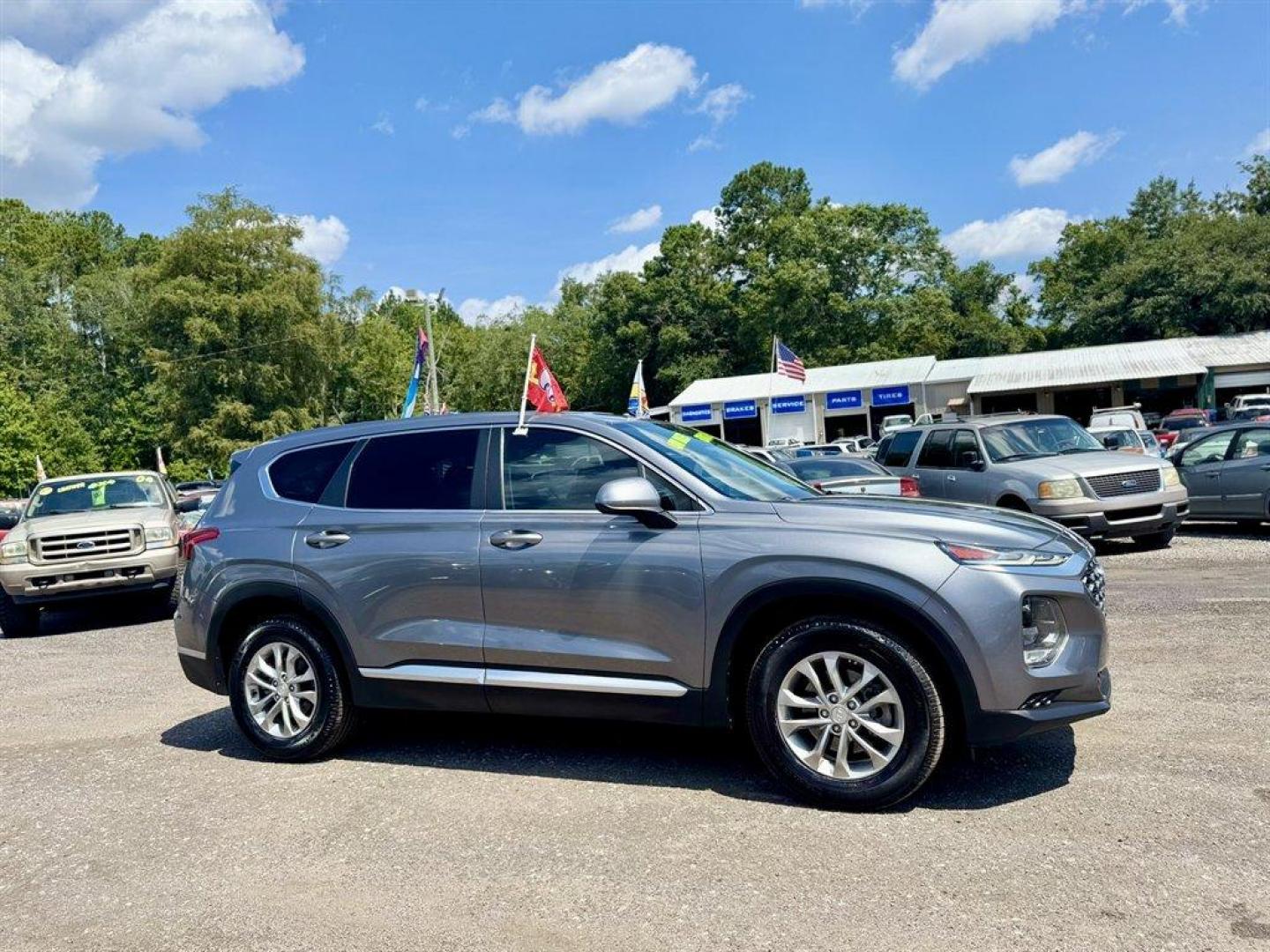 2019 Grey /Black Hyundai Santa FE (5NMS23AD7KH) with an 2.4l I-4 DI Dohc 2.4l engine, Automatic transmission, located at 745 East Steele Rd., West Columbia, SC, 29170, (803) 755-9148, 33.927212, -81.148483 - Special Internet Price! 2019 Hyundai Santa Fe with AM/FM radio, Bluetooth, Backup camera, Cruise control, Keyless entry, Cloth interior, Powered windows, Powered door locks, Plus more! - Photo#2