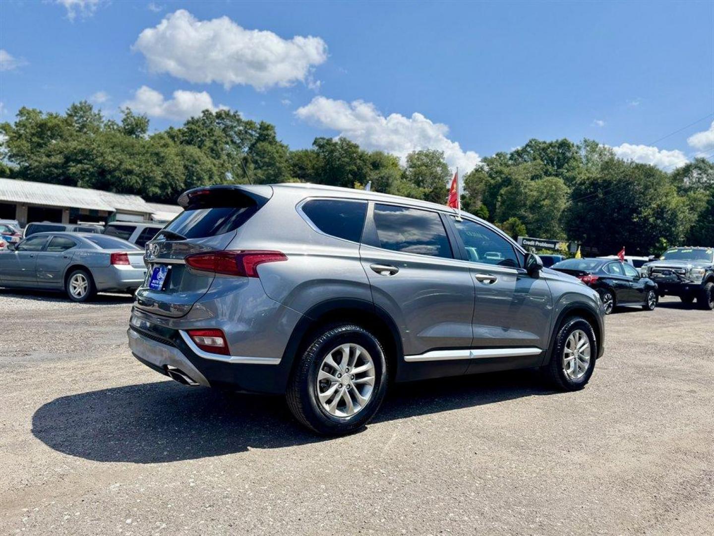 2019 Grey /Black Hyundai Santa FE (5NMS23AD7KH) with an 2.4l I-4 DI Dohc 2.4l engine, Automatic transmission, located at 745 East Steele Rd., West Columbia, SC, 29170, (803) 755-9148, 33.927212, -81.148483 - Special Internet Price! 2019 Hyundai Santa Fe with AM/FM radio, Bluetooth, Backup camera, Cruise control, Keyless entry, Cloth interior, Powered windows, Powered door locks, Plus more! - Photo#3