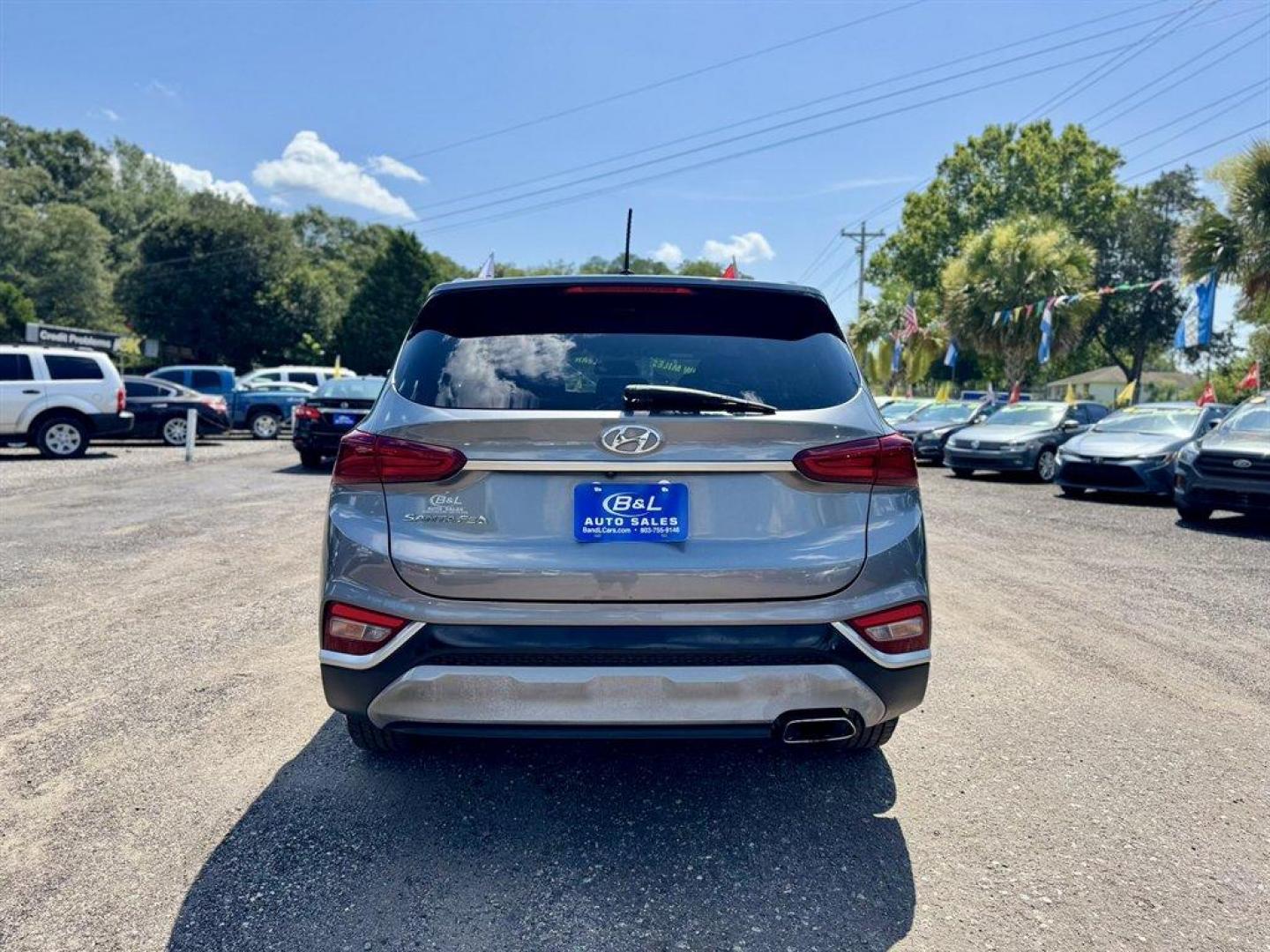 2019 Grey /Black Hyundai Santa FE (5NMS23AD7KH) with an 2.4l I-4 DI Dohc 2.4l engine, Automatic transmission, located at 745 East Steele Rd., West Columbia, SC, 29170, (803) 755-9148, 33.927212, -81.148483 - Special Internet Price! 2019 Hyundai Santa Fe with AM/FM radio, Bluetooth, Backup camera, Cruise control, Keyless entry, Cloth interior, Powered windows, Powered door locks, Plus more! - Photo#4