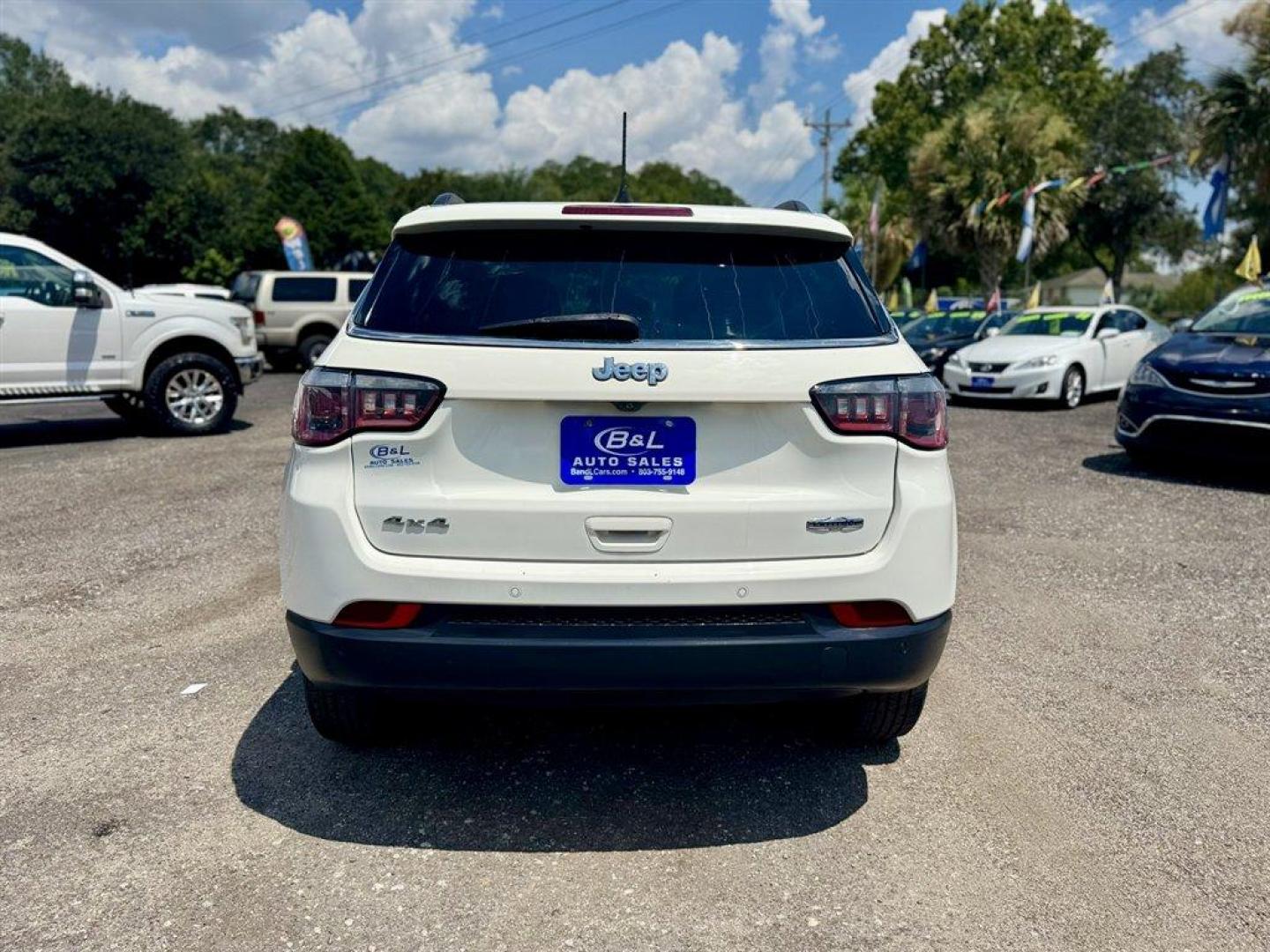 2017 White /Black Jeep ALL NEW Compass (3C4NJDBB2HT) with an 2.4l I-4 SFI Dohc 2.4l engine, Automatic transmission, located at 745 East Steele Rd., West Columbia, SC, 29170, (803) 755-9148, 33.927212, -81.148483 - Special Internet Price! 2017 Jeep All New Compass with AM/ FM radio, Bluetooth, Backup camera, 4x4, Leather interior, Keyless entry, Powered driver seat, Powered windows, Powered door locks, Plus more! - Photo#4