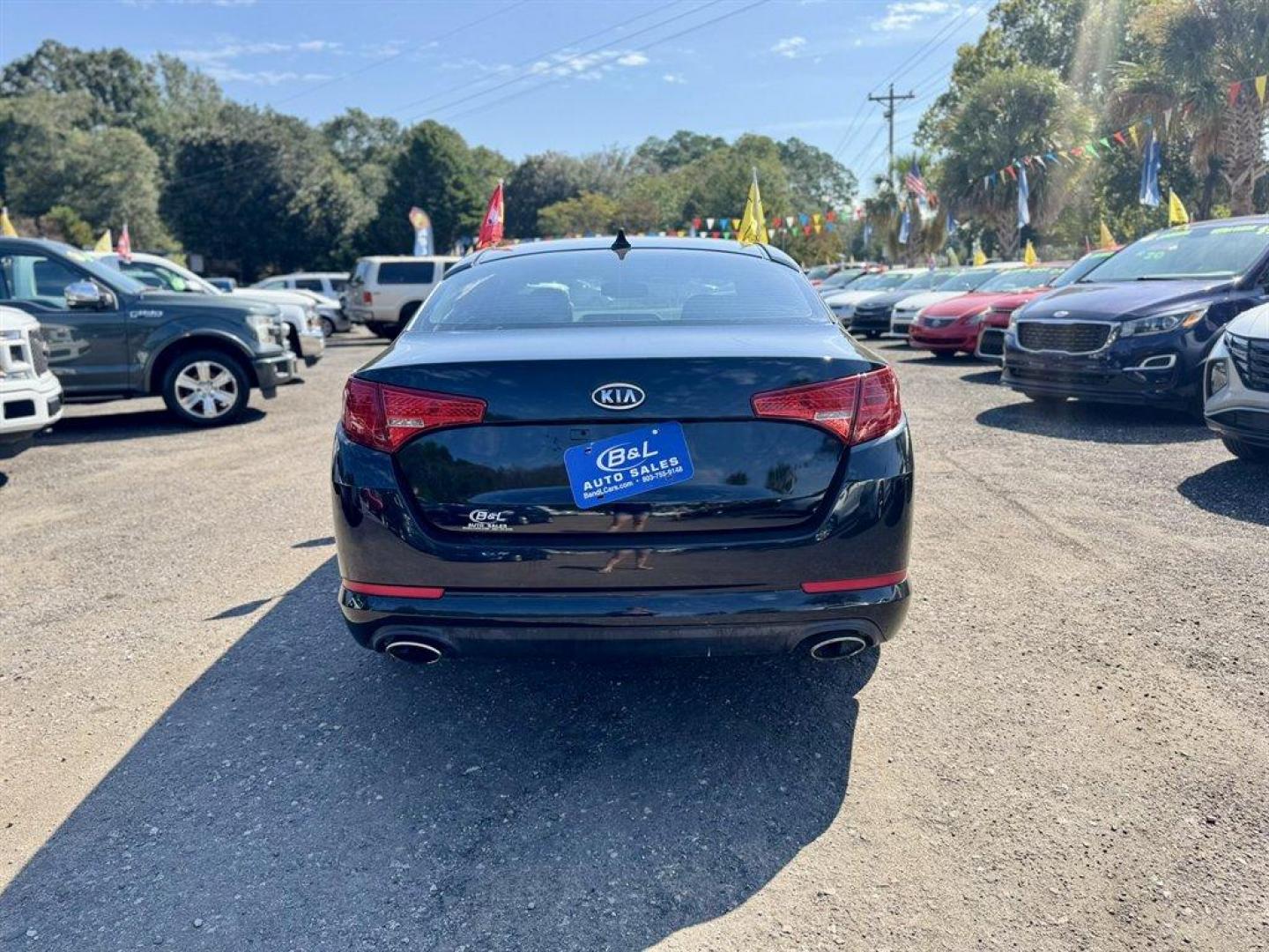 2011 Black /Grey Kia Optima (KNAGN4A70B5) with an 2.4l I-4 DI Dohc 2.4l engine, Automatic transmission, located at 745 East Steele Rd., West Columbia, SC, 29170, (803) 755-9148, 33.927212, -81.148483 - Special Internet Price! 2011 Kia Optima - Photo#4