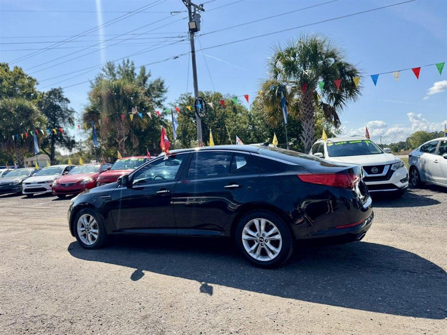 2011 Black /Grey Kia Optima (KNAGN4A70B5) with an 2.4l I-4 DI Dohc 2.4l engine, Automatic transmission, located at 745 East Steele Rd., West Columbia, SC, 29170, (803) 755-9148, 33.927212, -81.148483 - Special Internet Price! 2011 Kia Optima - Photo#5
