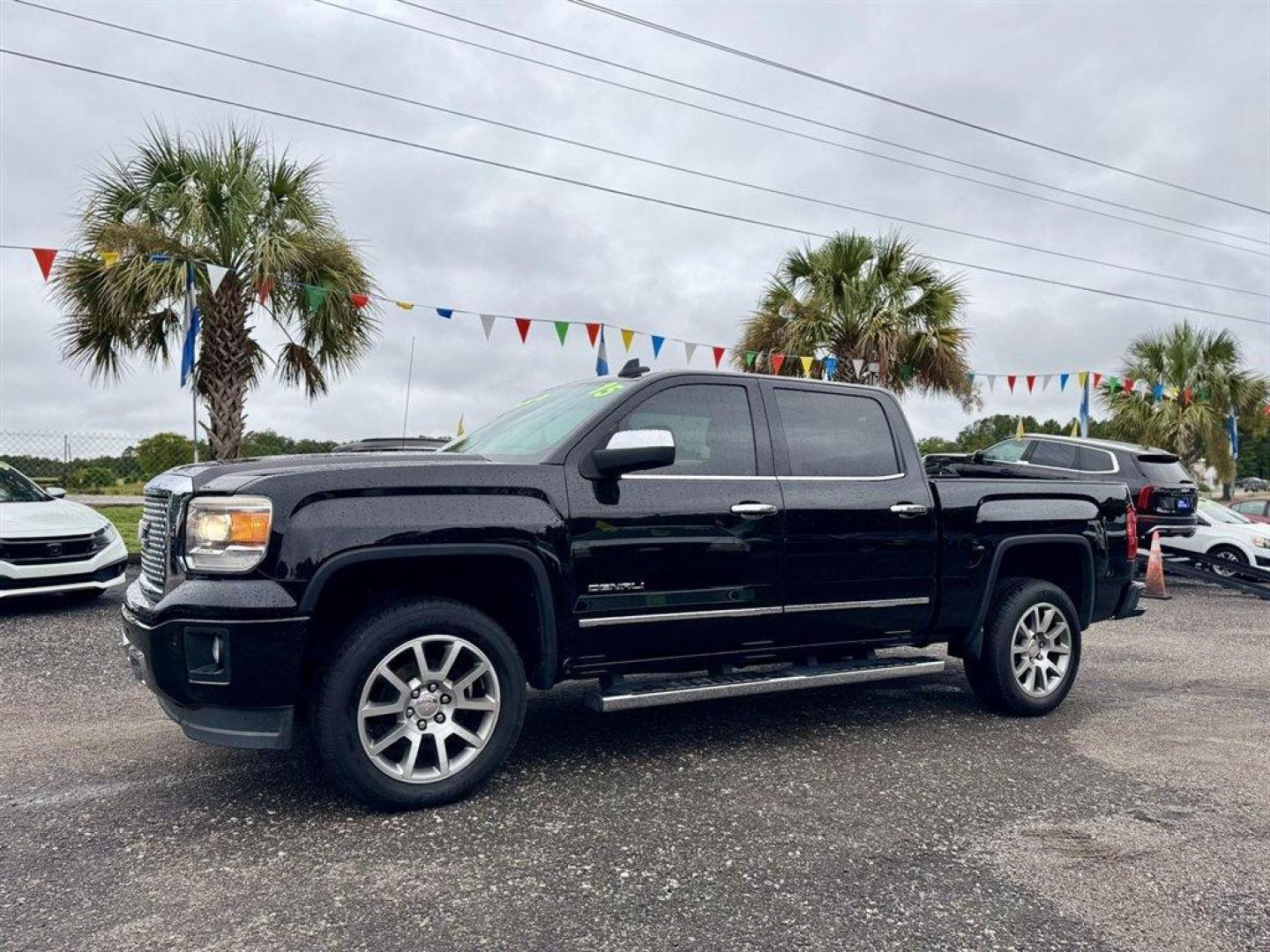 2015 Black /Black GMC Sierra 1500 (3GTU2WEJ9FG) with an 6.2l V8 DI VVT Flex 6.2l engine, Automatic transmission, located at 745 East Steele Rd., West Columbia, SC, 29170, (803) 755-9148, 33.927212, -81.148483 - Special Internet Price! 2015 GMC Sierra 1500 with AM/FM radio, Bluetooth, Backup camera, Navigation, Leather interior, Sunroof, Keyless entry, Powered driver seat, Heated front seats, Powered windows, Powered door locks, Plus more! - Photo#0