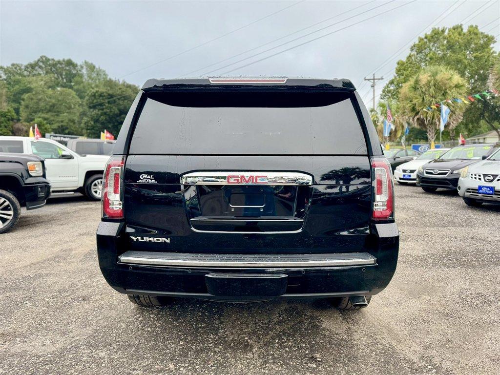 2020 Black /Black GMC Yukon (1GKS1CKJ0LR) with an 6.2l V8 DI VVT Flex 6.2l engine, Automatic transmission, located at 745 East Steele Rd., West Columbia, SC, 29170, (803) 755-9148, 33.927212, -81.148483 - Special Internet Price! 2020 GMC Yukon with AM/FM radio, Bluetooth, Backup camera, Navigation, Sunroof, Keyless entry, Push to start, Cruise control, Leather interior, 3rd row seating, Rear entertainment, Powered liftgate, Powered windows, Powered door locks, Plus more! - Photo#4